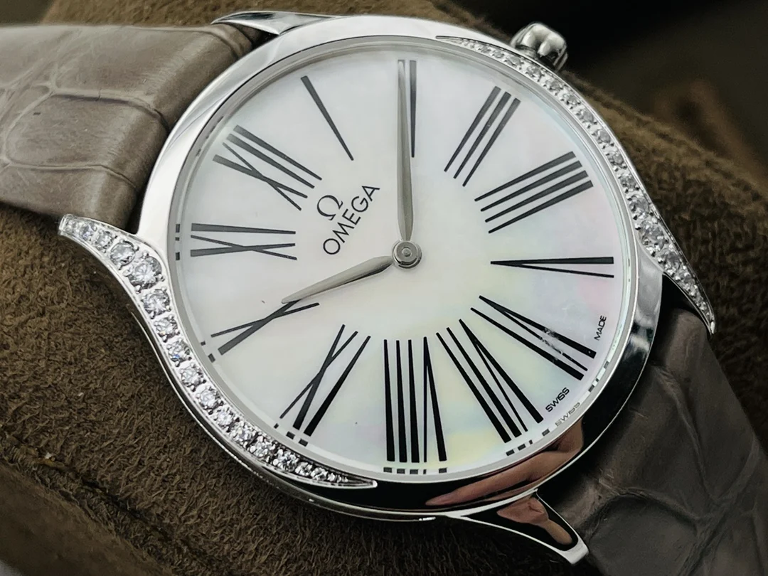 Omega De Ville Ceramic Red Dial Diamond-Set — photographed off the sweep