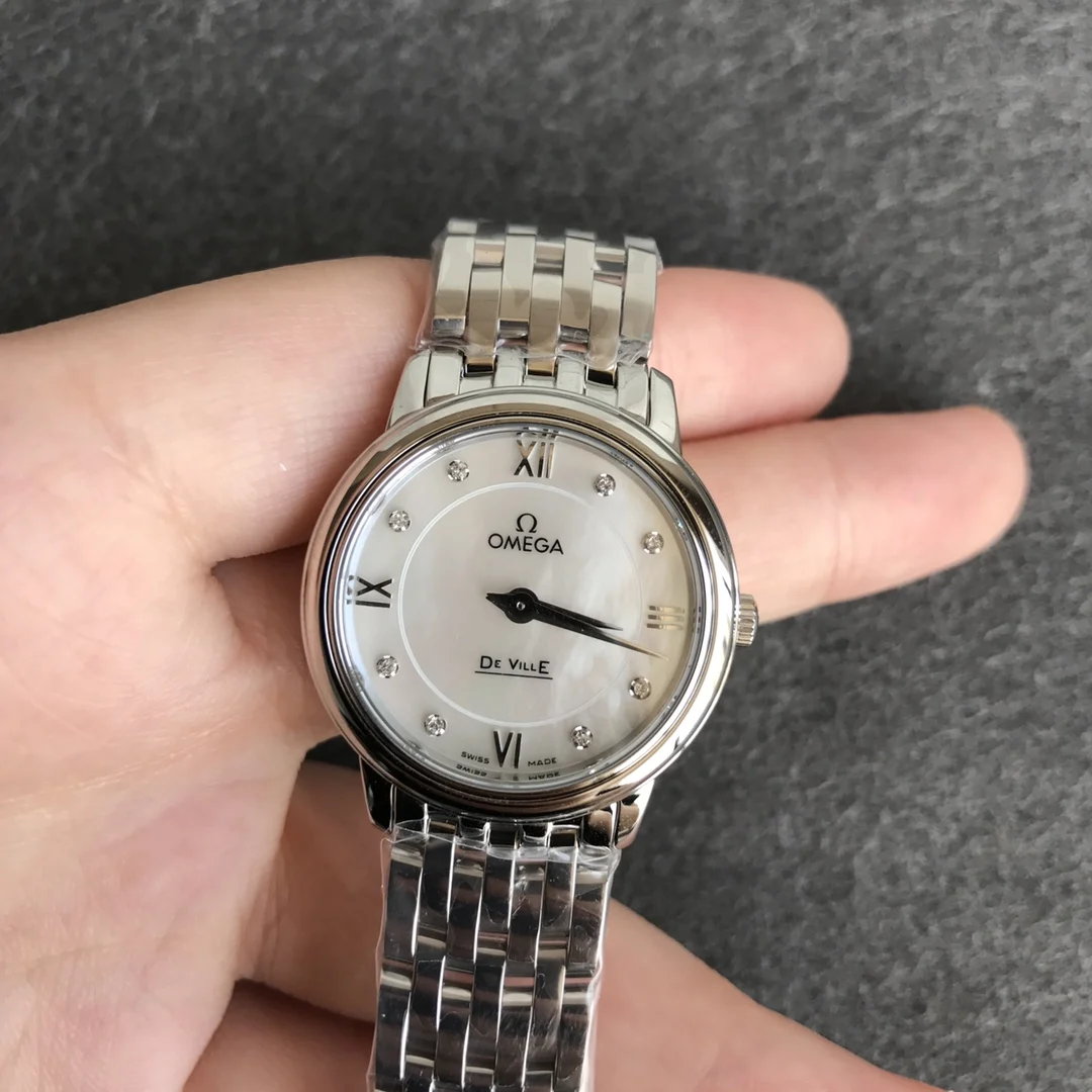 Omega De Ville Rose Gold 27.4mm — photographed off the sweep