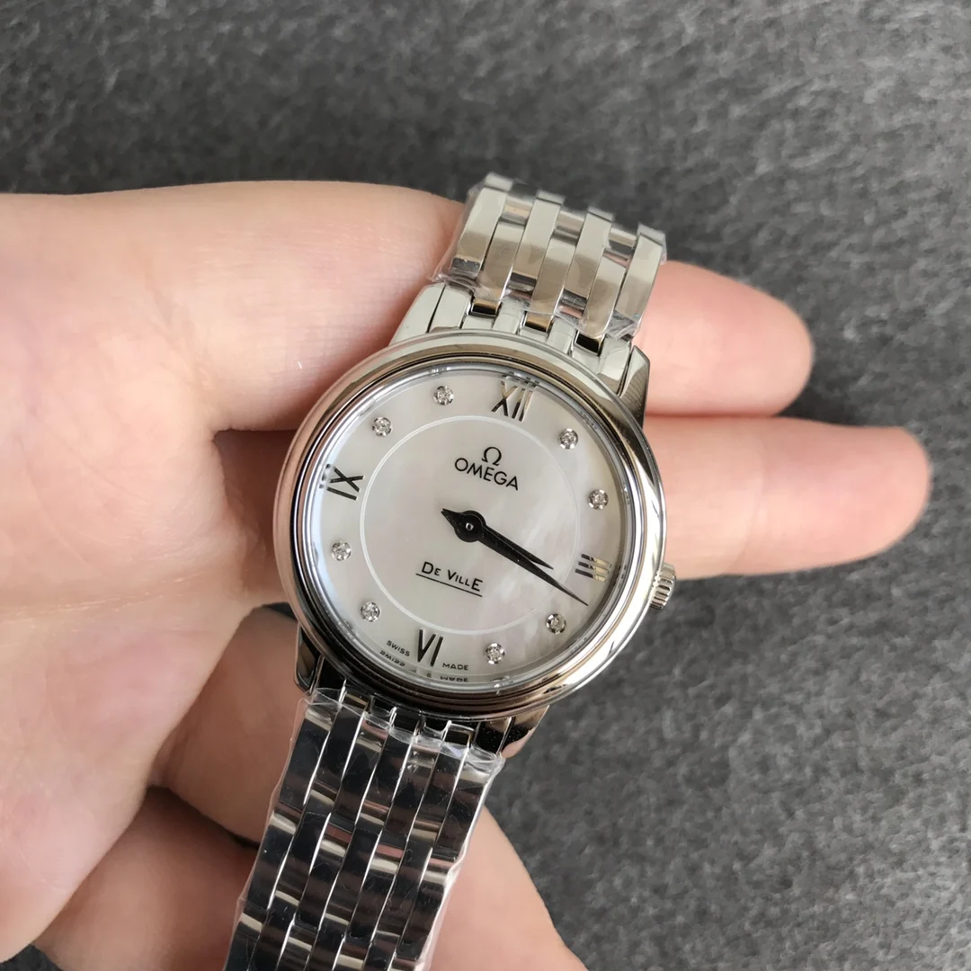 Omega De Ville Rose Gold 27.4mm — photographed off the sweep