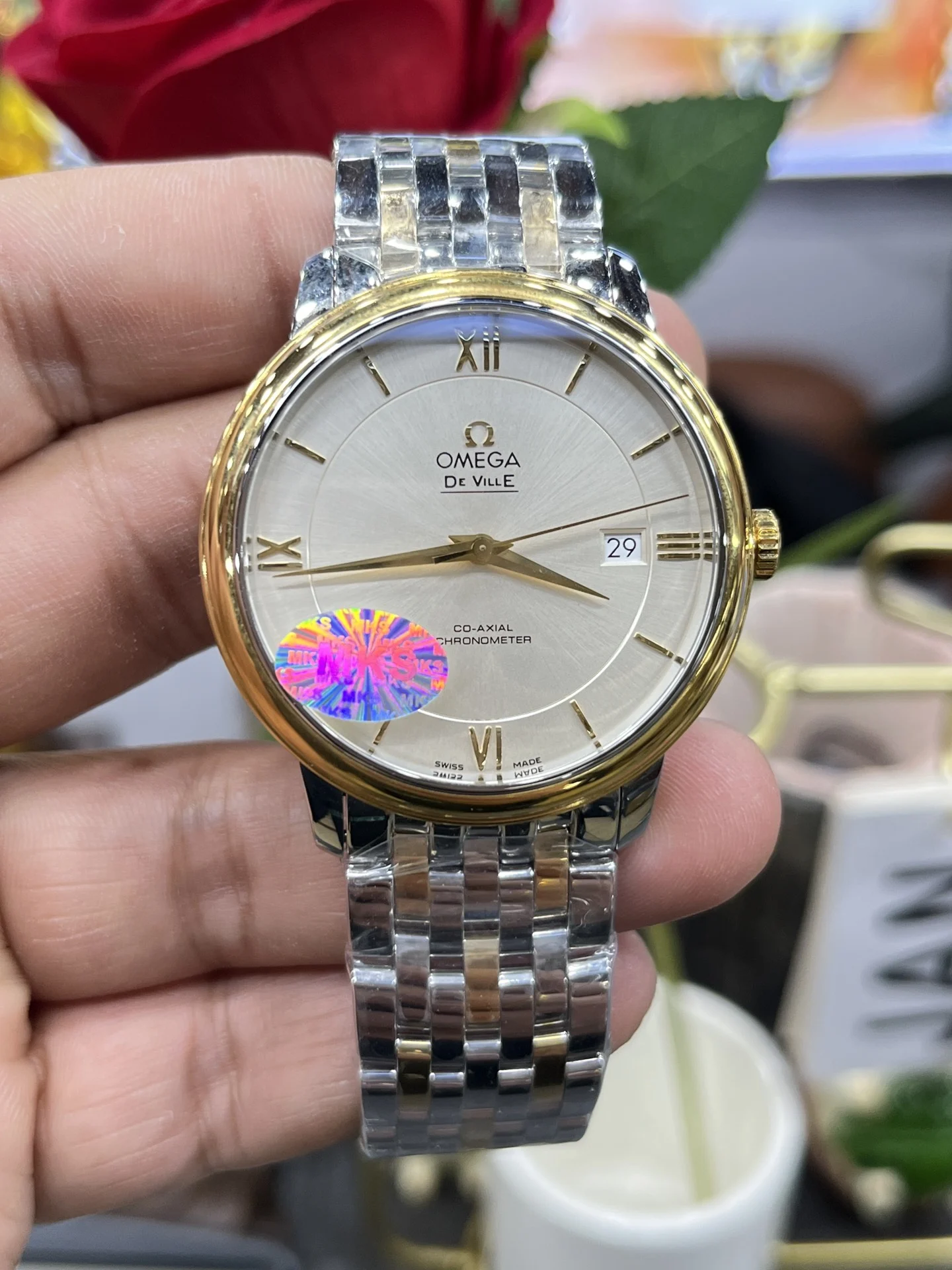Omega De Ville White Dial 39.5mm — photographed off the sweep