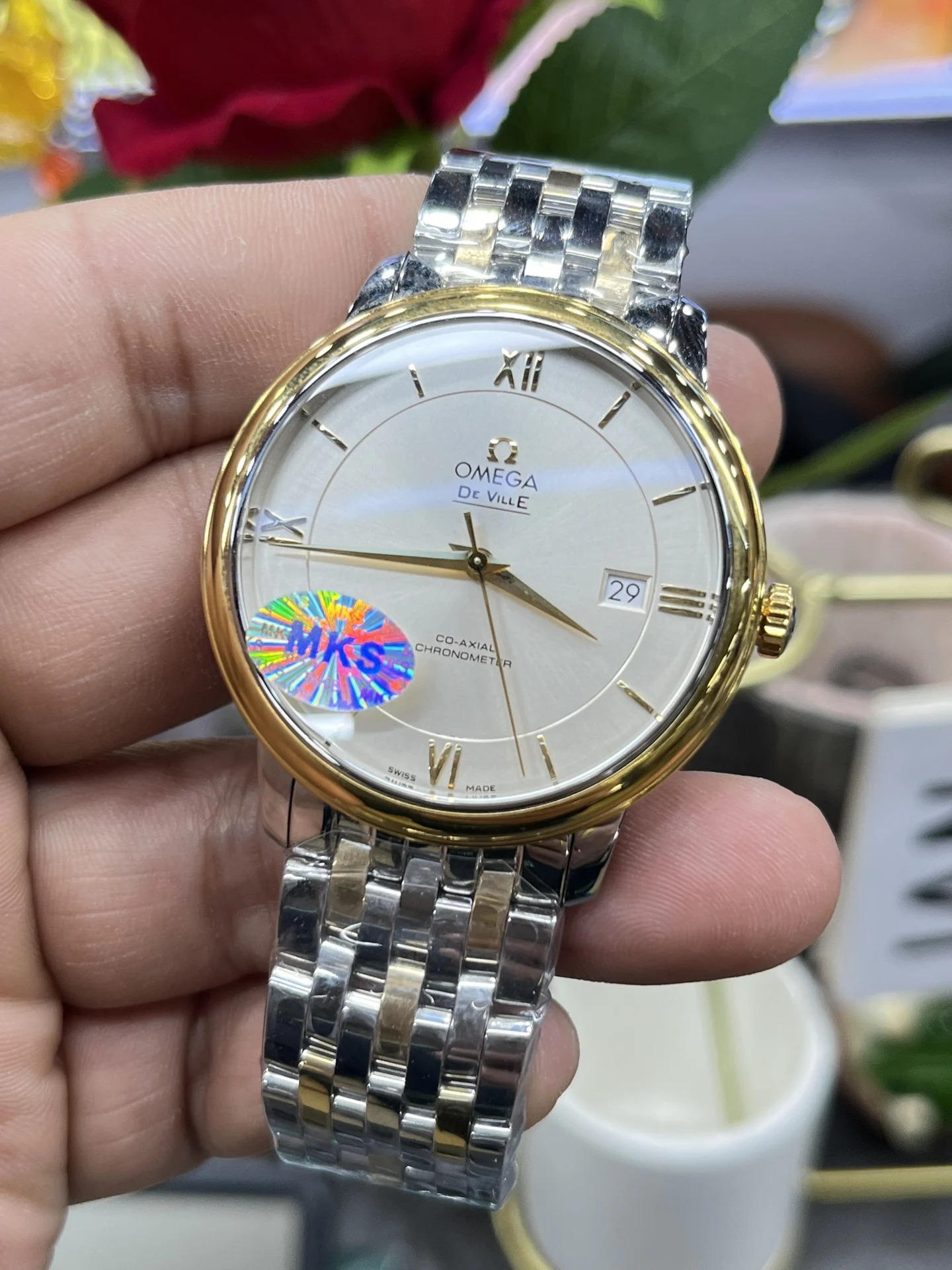 Omega De Ville White Dial 39.5mm — photographed off the sweep