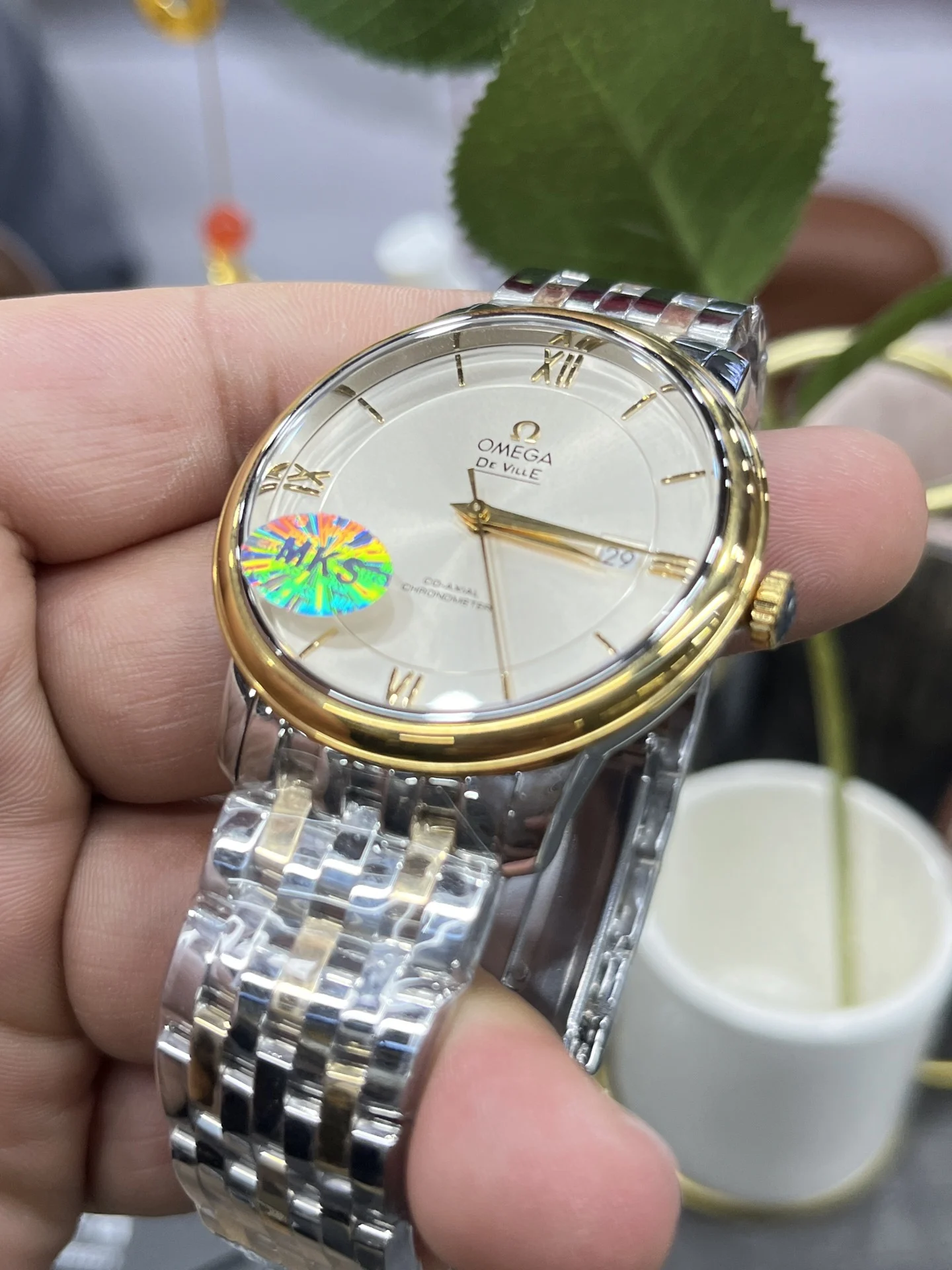 Omega De Ville White Dial 39.5mm — photographed off the sweep