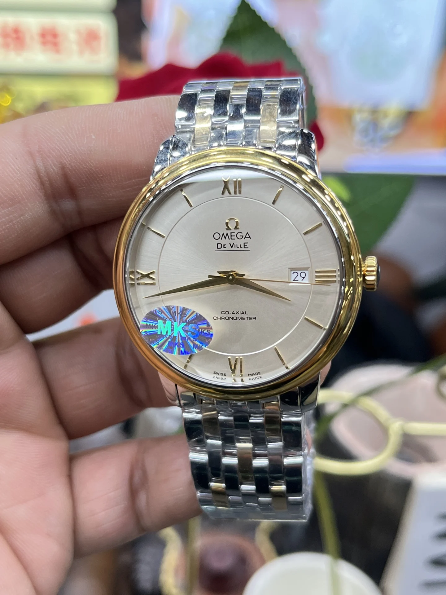 Omega De Ville White Dial 39.5mm — photographed off the sweep