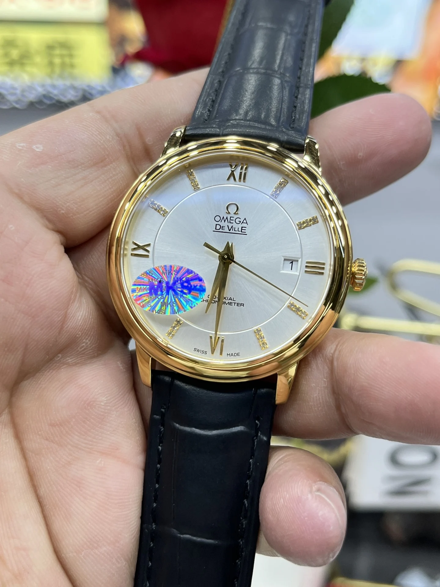 Omega Golden Butterfly — photographed off the sweep