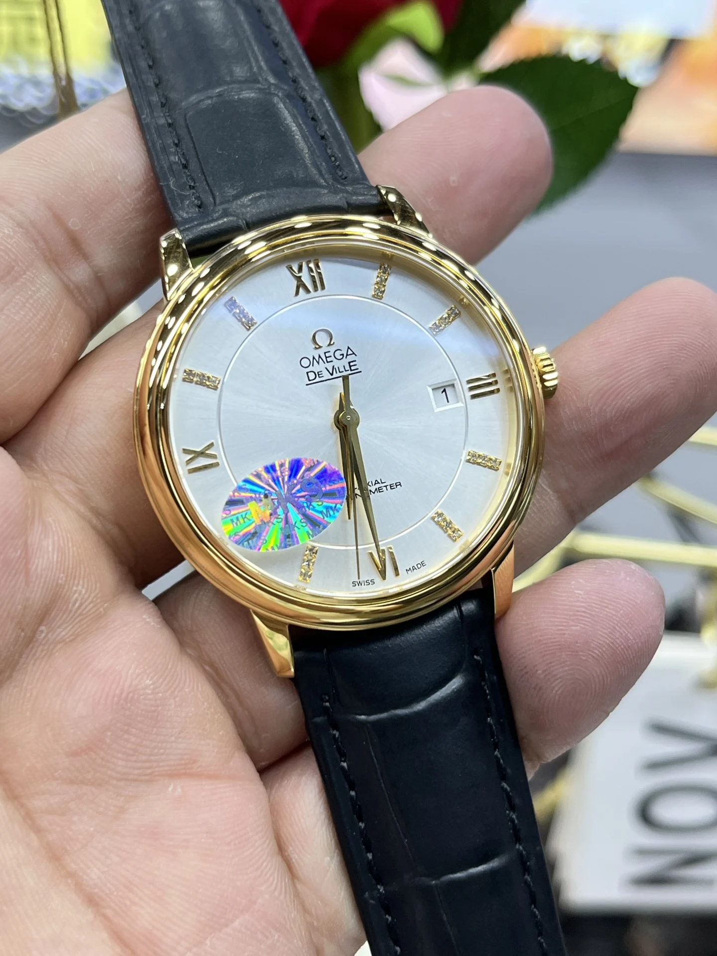 Omega Golden Butterfly — photographed off the sweep