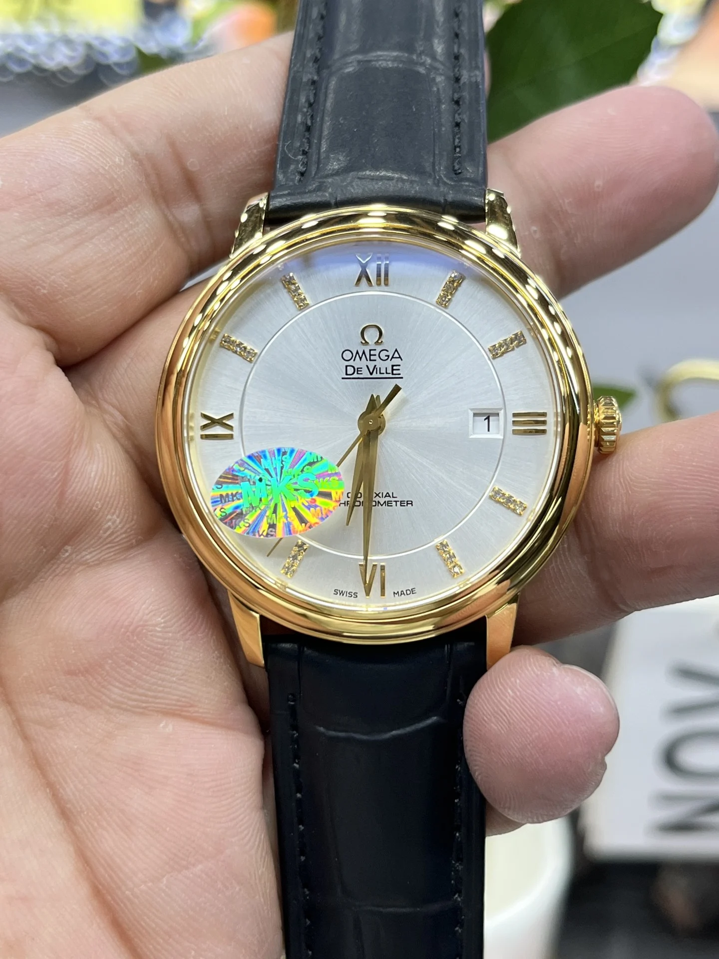 Omega Golden Butterfly — photographed off the sweep