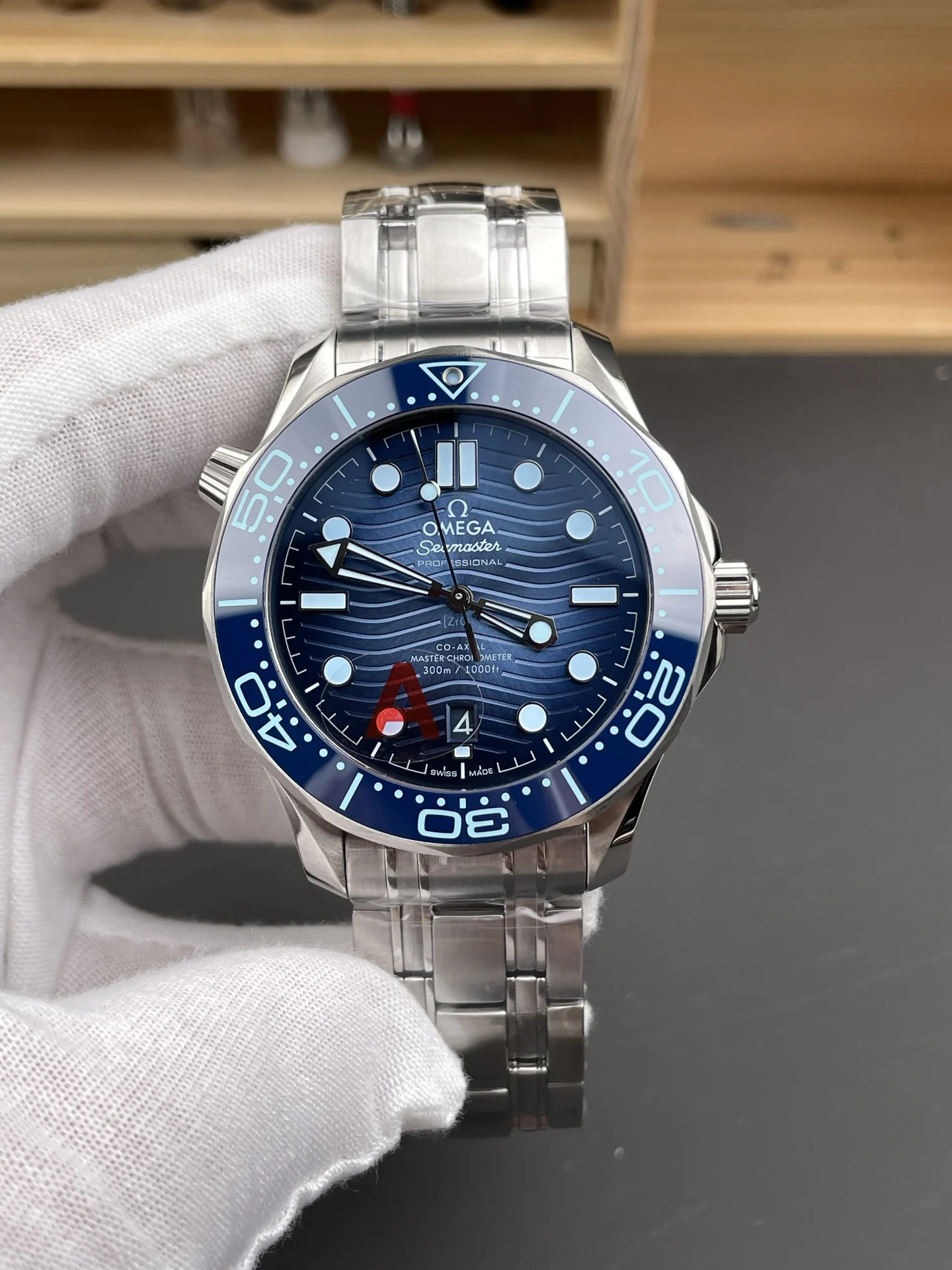 Omega Seamaster 300 Blue Dial 42mm — photographed off the sweep