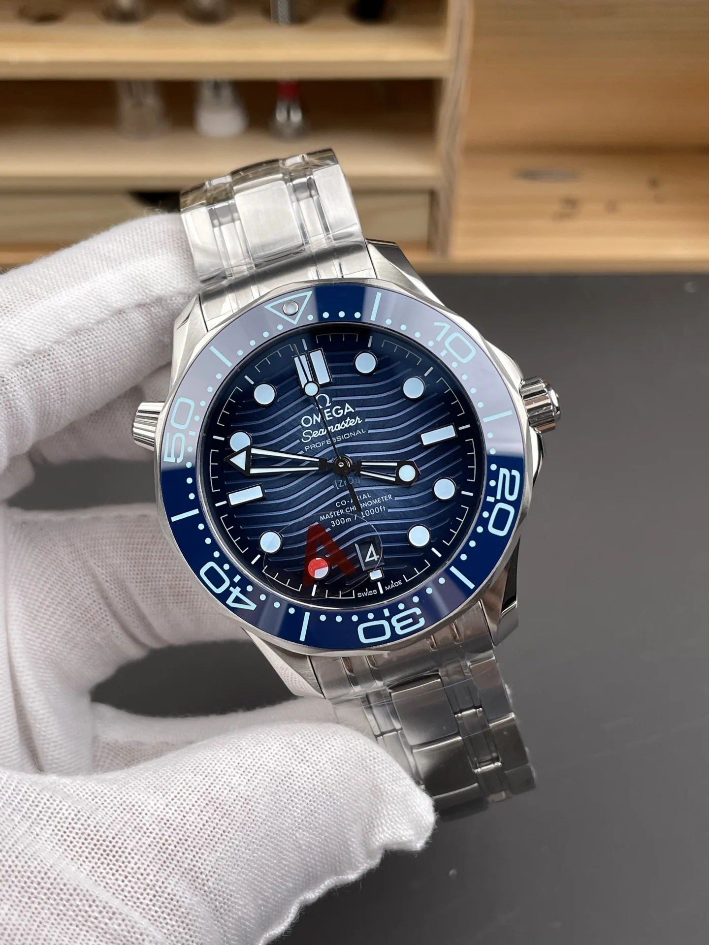Omega Seamaster 300 Blue Dial 42mm — photographed off the sweep