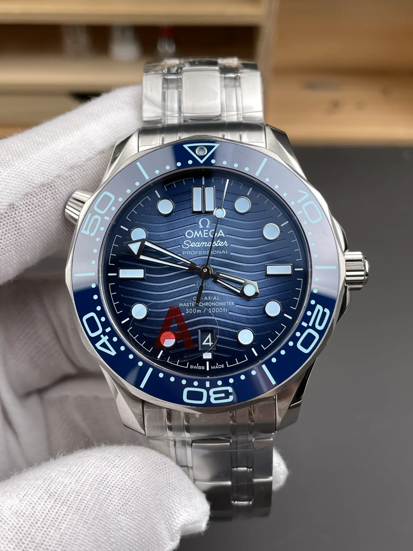 Omega Seamaster 300 Blue Dial 42mm — photographed off the sweep