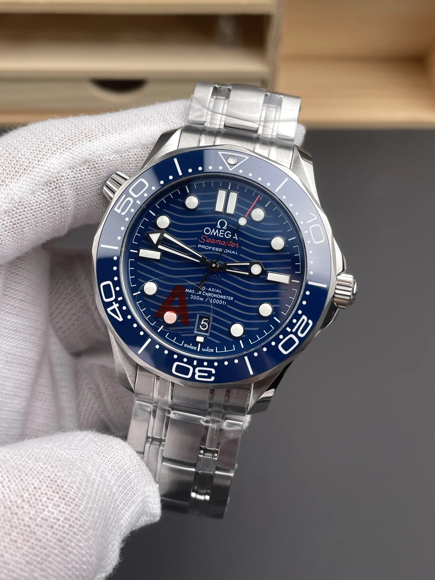 Omega Seamaster 300 Blue Dial 42mm — photographed off the sweep