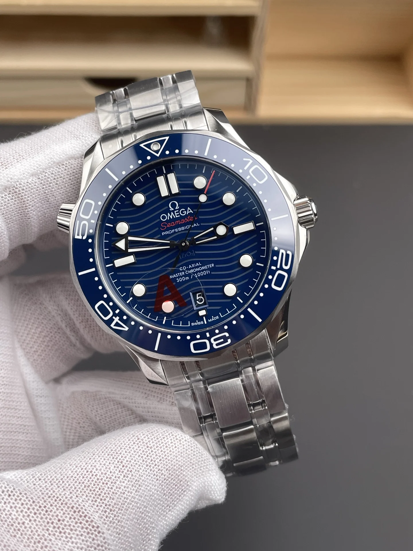 Omega Seamaster 300 Blue Dial 42mm — photographed off the sweep
