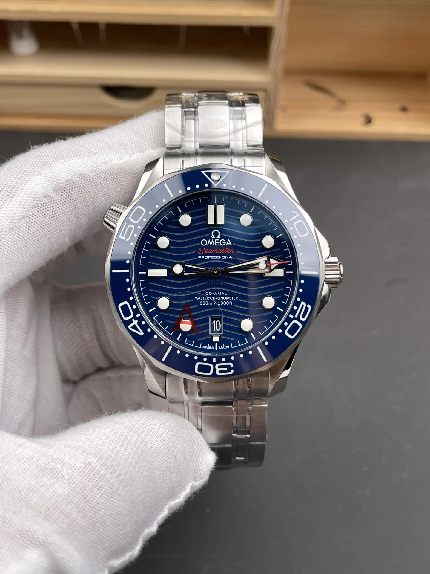 Omega Seamaster 300 Blue Dial 42mm — photographed off the sweep