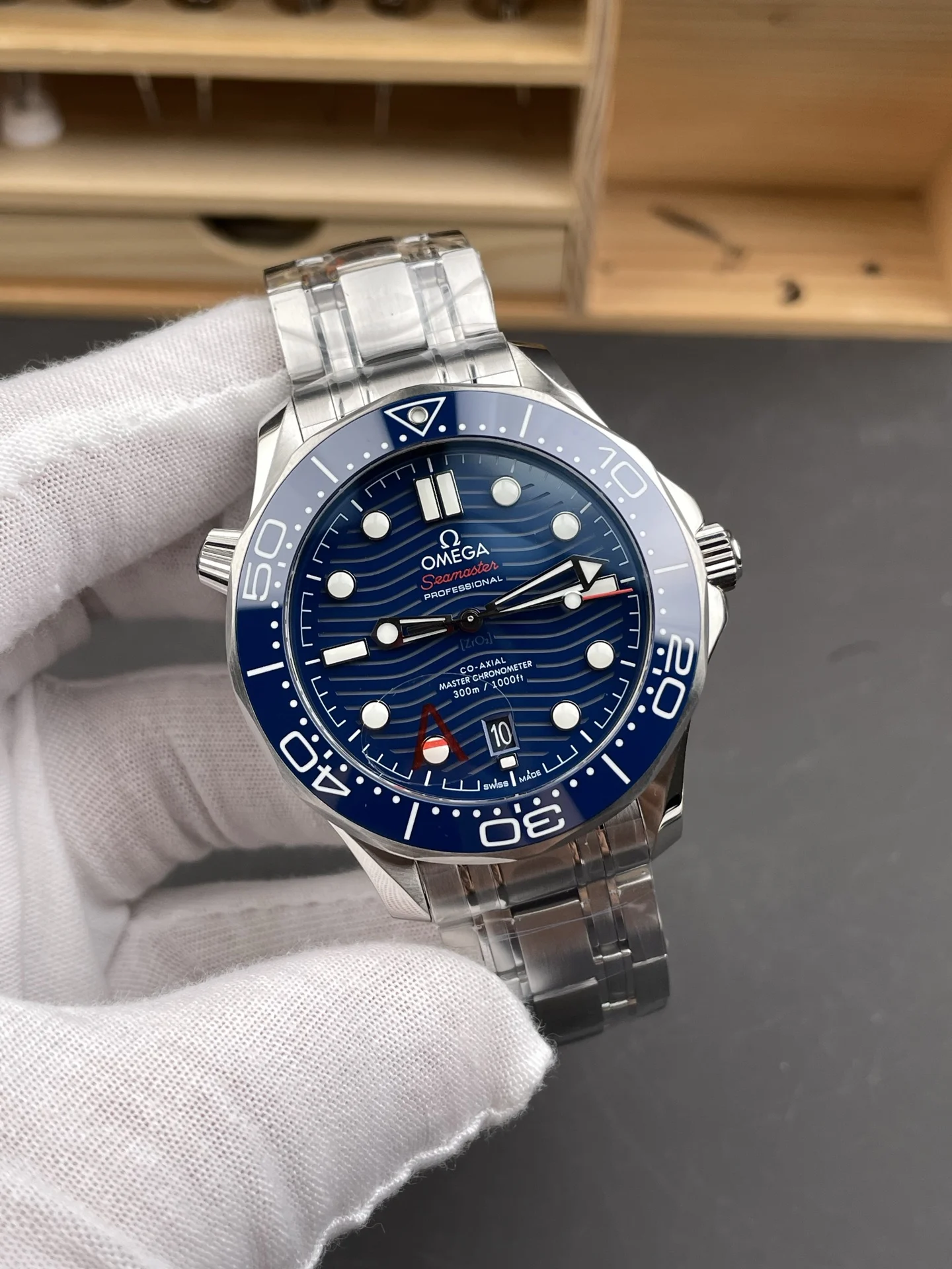 Omega Seamaster 300 Blue Dial 42mm — photographed off the sweep