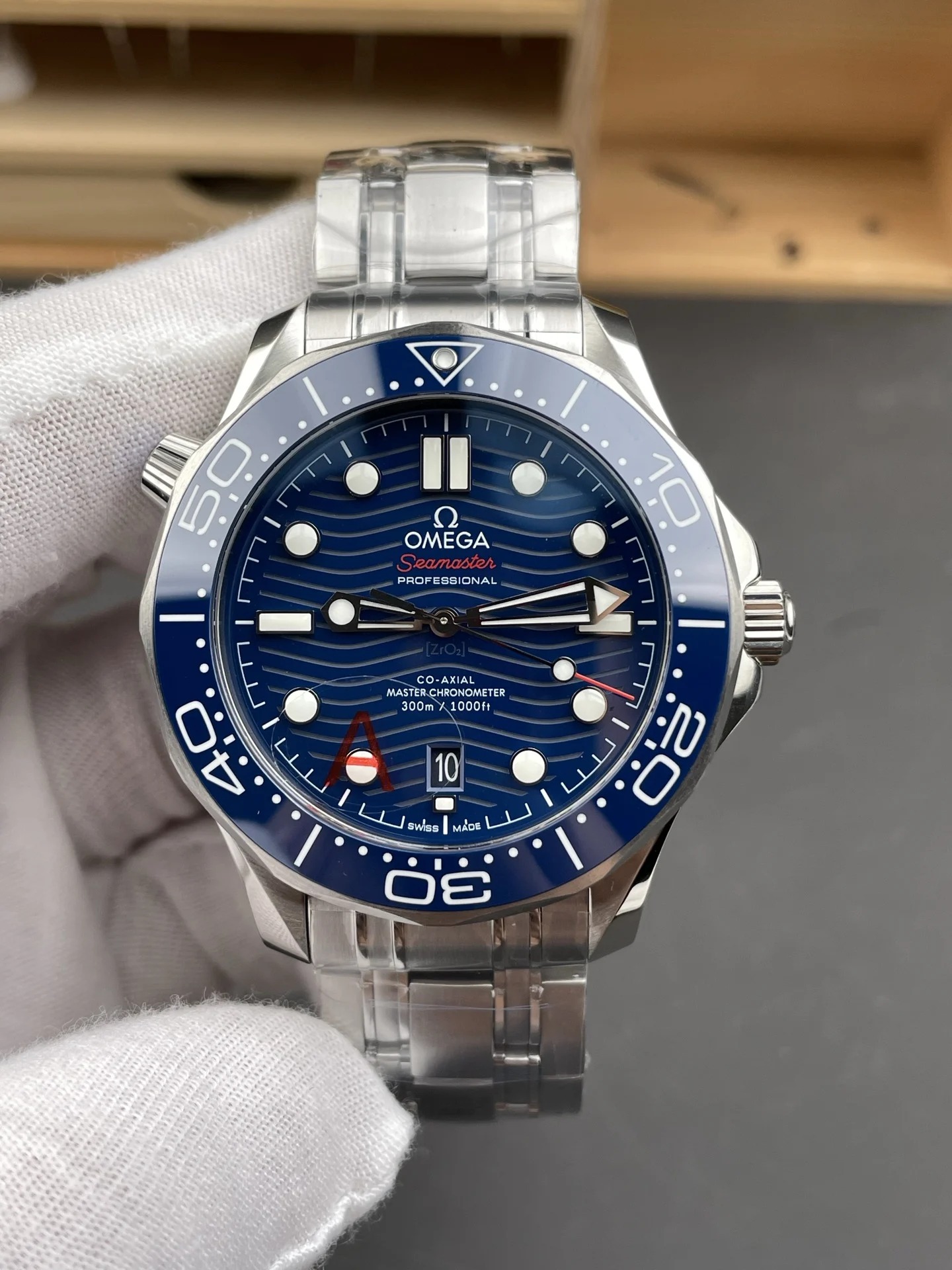 Omega Seamaster 300 Blue Dial 42mm — photographed off the sweep