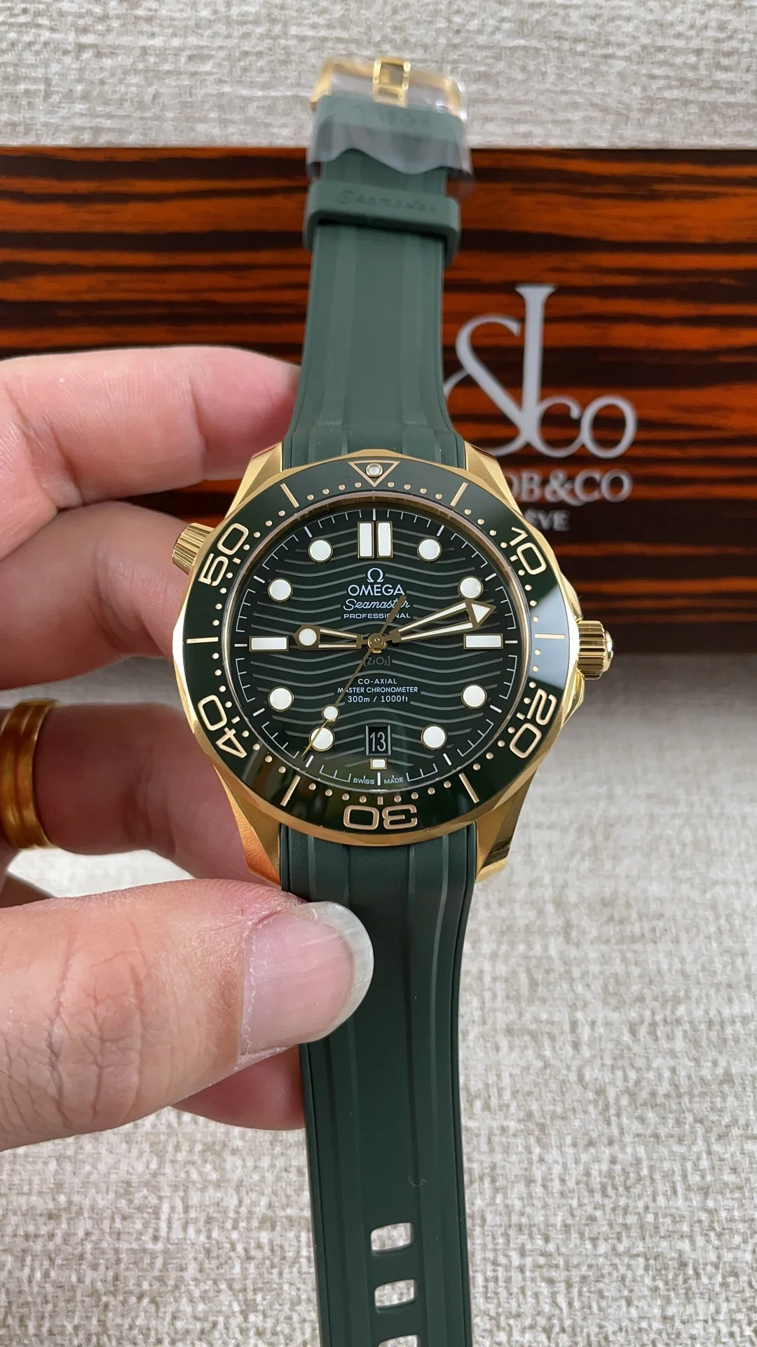 Omega Seamaster 300 Green Dial — photographed off the sweep