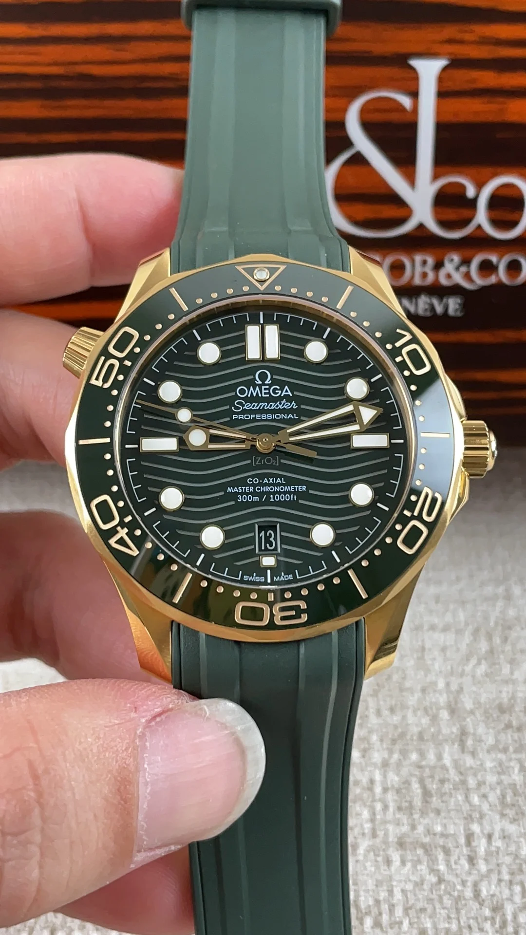 Omega Seamaster 300 Green Dial — photographed off the sweep