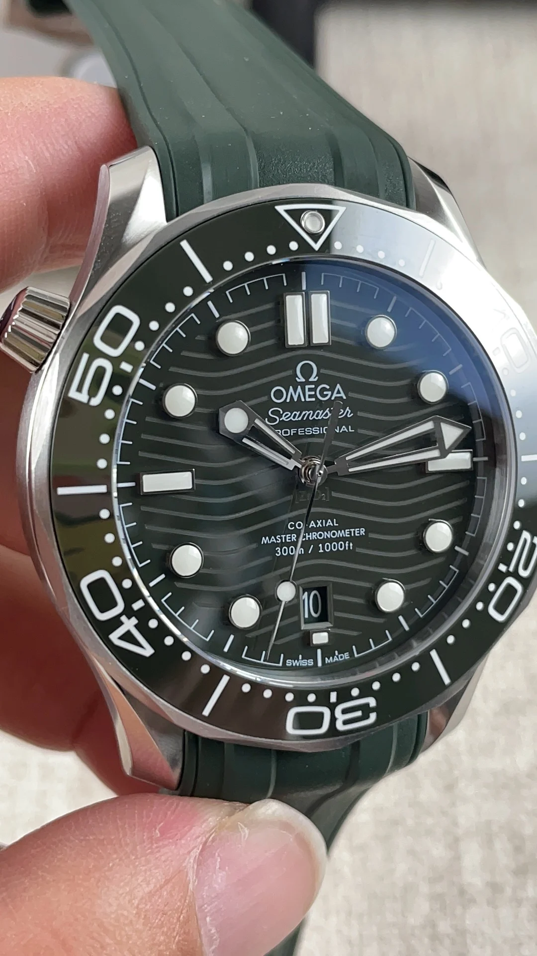 Omega Seamaster 300 Green Dial — photographed off the sweep