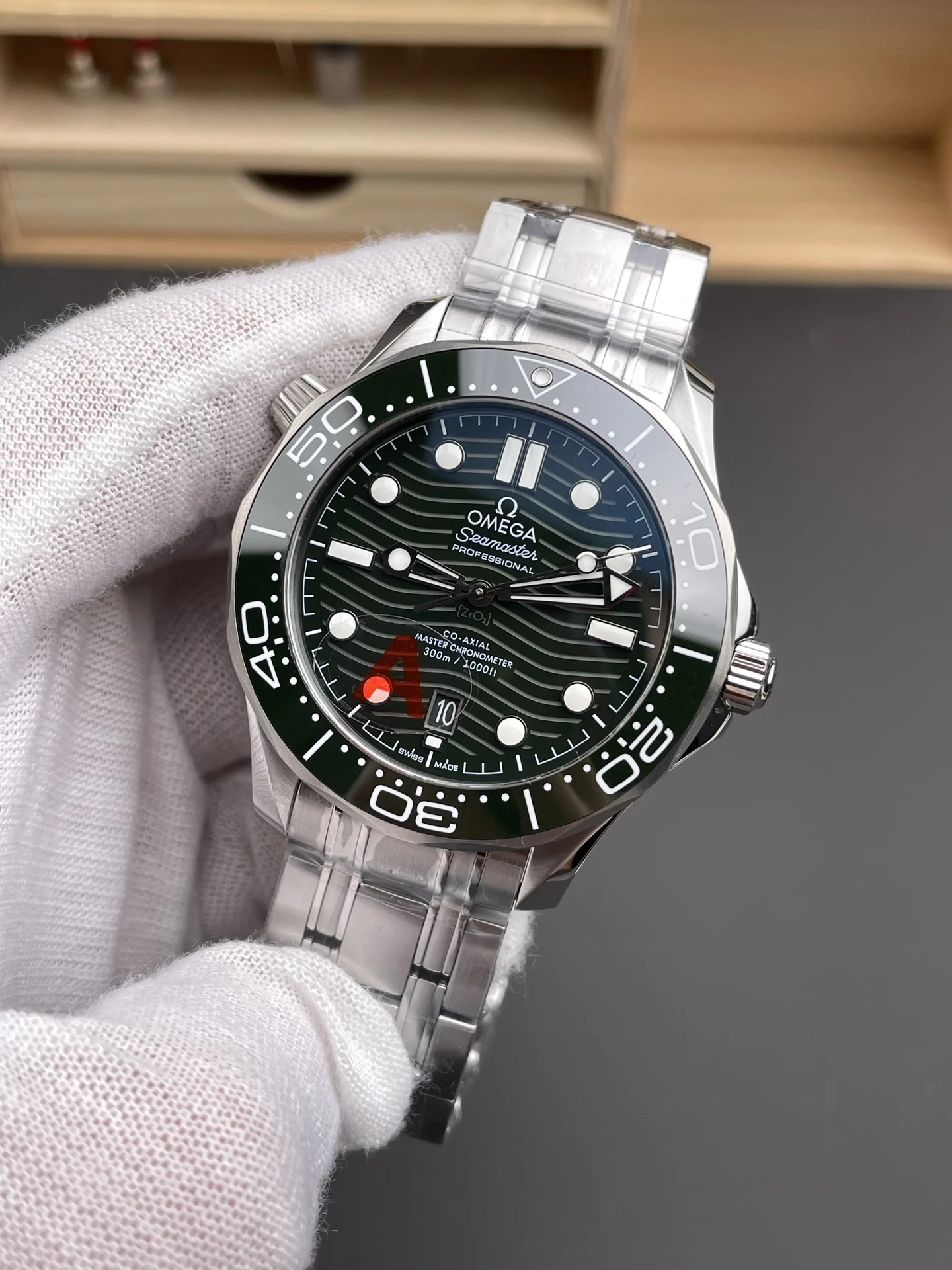 Omega Seamaster 300 Green Dial 42mm — photographed off the sweep