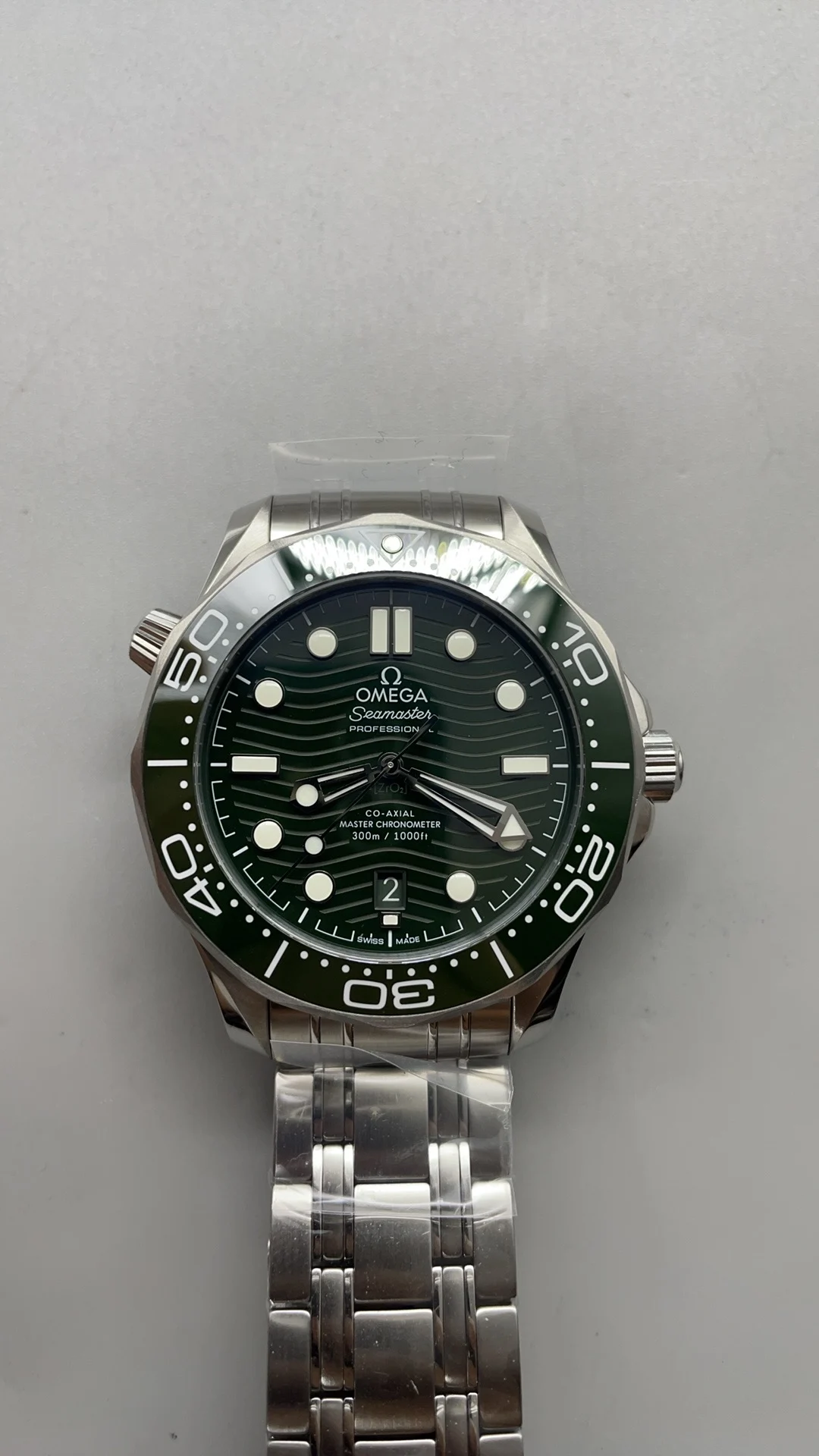 Omega Seamaster 300 Green Dial — photographed off the sweep