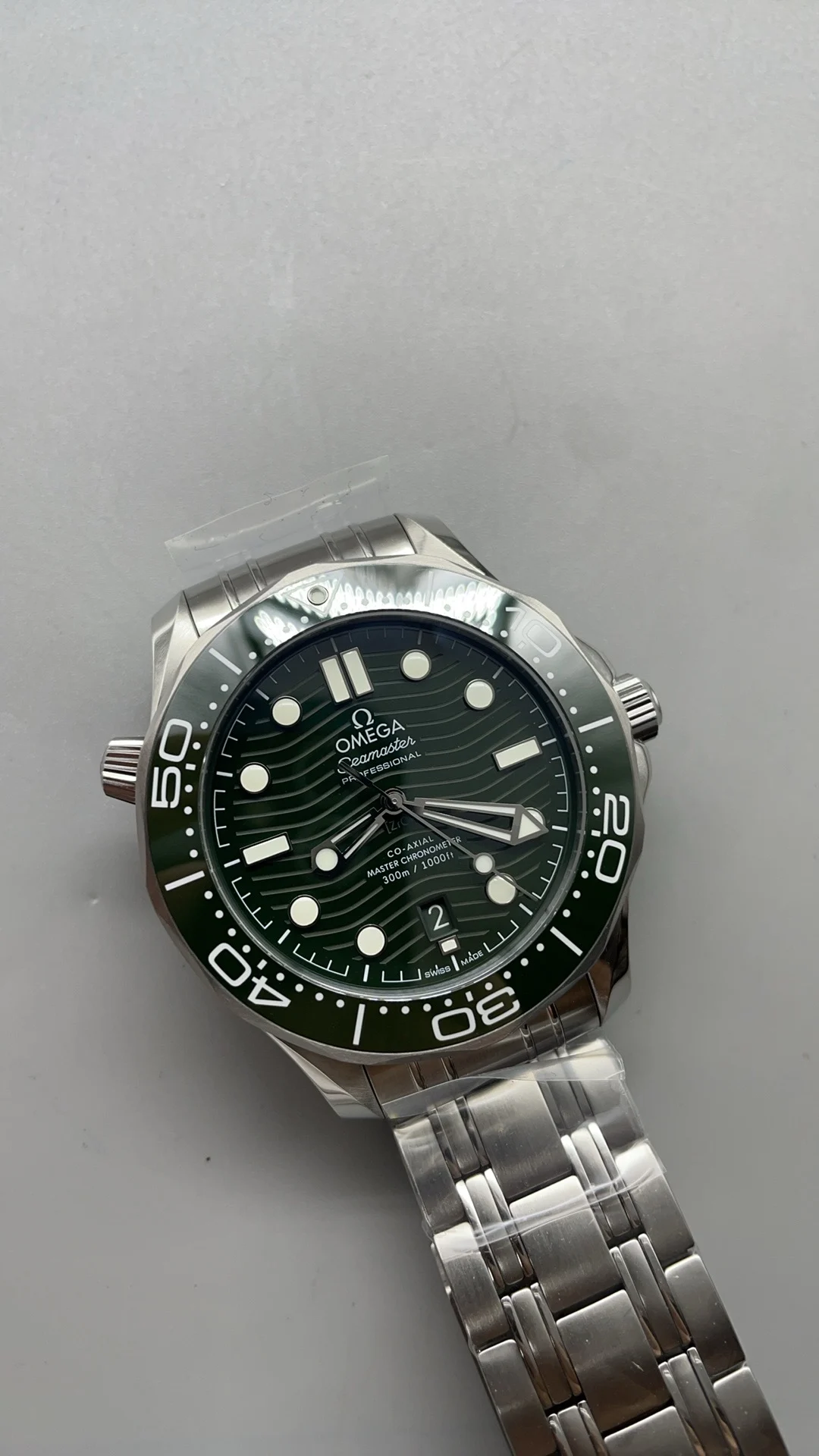 Omega Seamaster 300 Green Dial — photographed off the sweep
