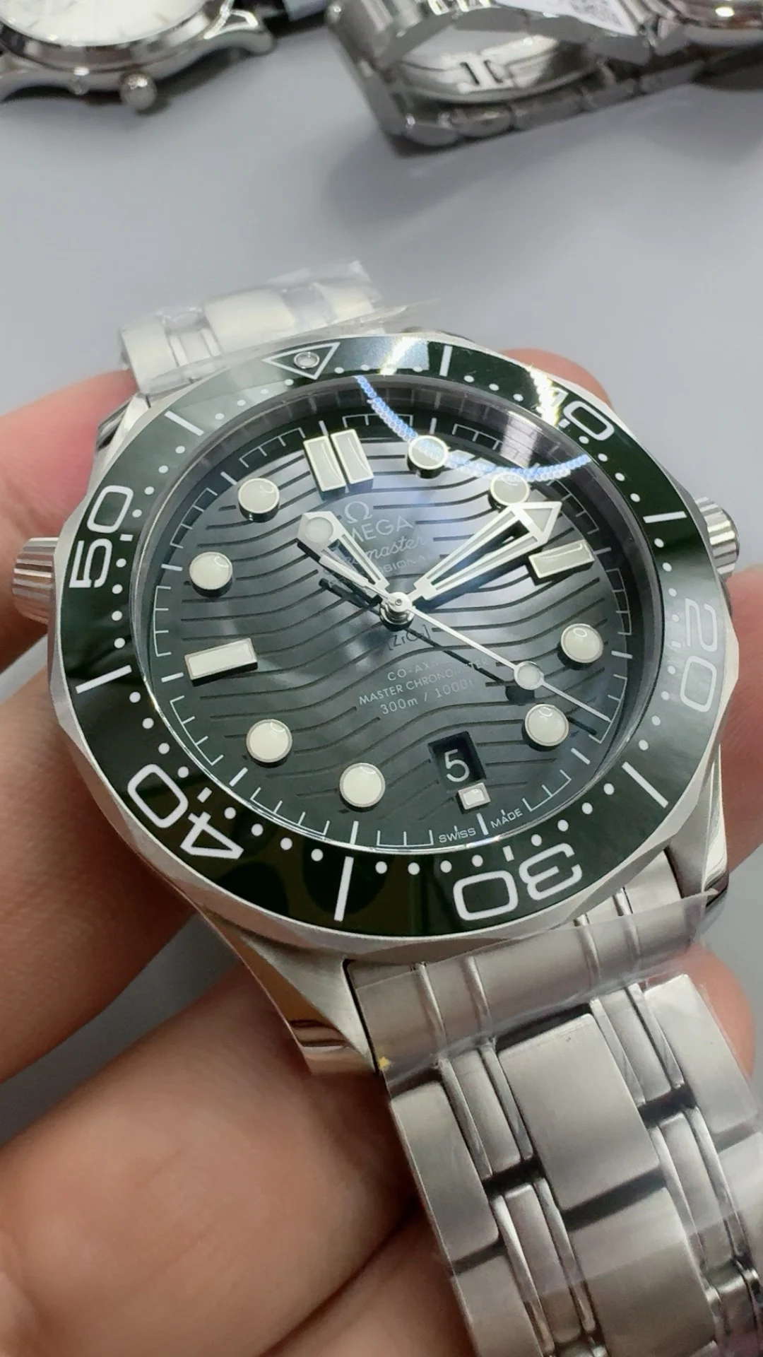 Omega Seamaster 300 Green Dial — photographed off the sweep