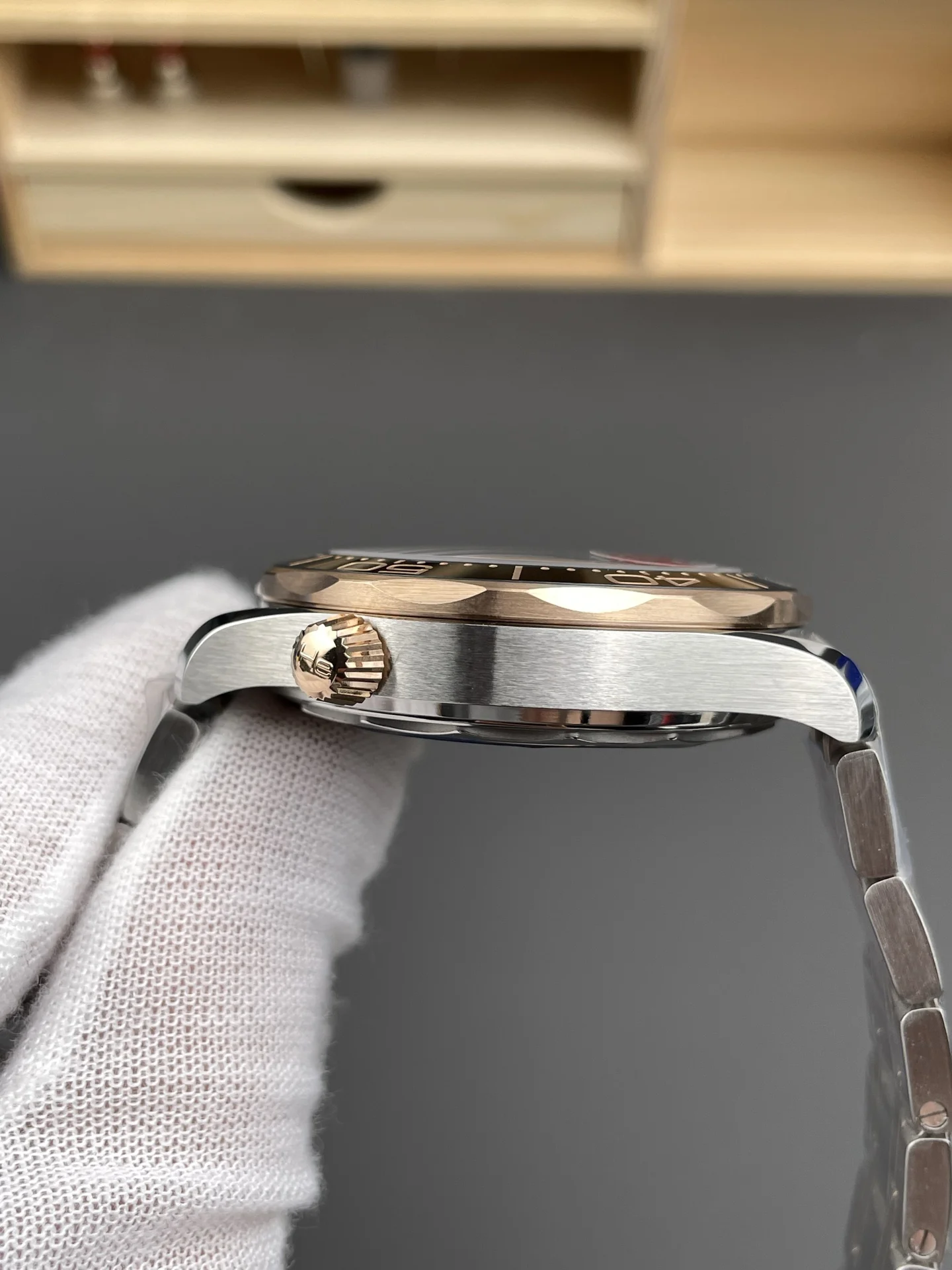 Omega Seamaster 300 Rose Gold Black Dial 42mm — photographed off the sweep