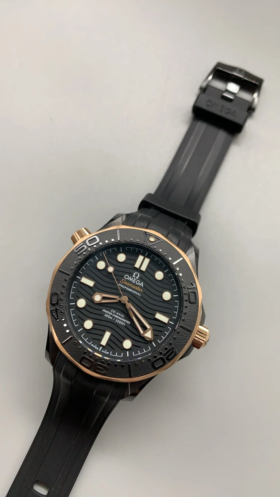 Omega Seamaster 300 Rose Gold Black Dial 43.5mm — photographed off the sweep