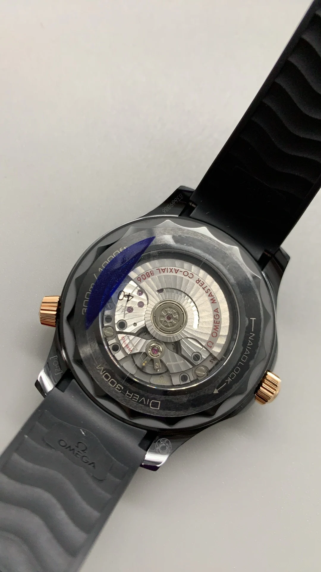 Omega Seamaster 300 Rose Gold Black Dial 43.5mm — photographed off the sweep