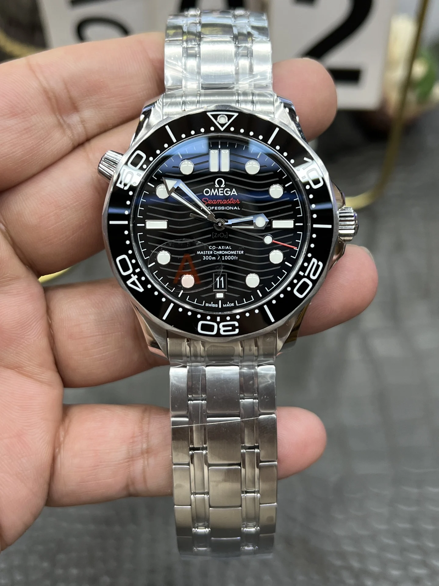 Omega Seamaster 300 Steel Black Dial — photographed off the sweep