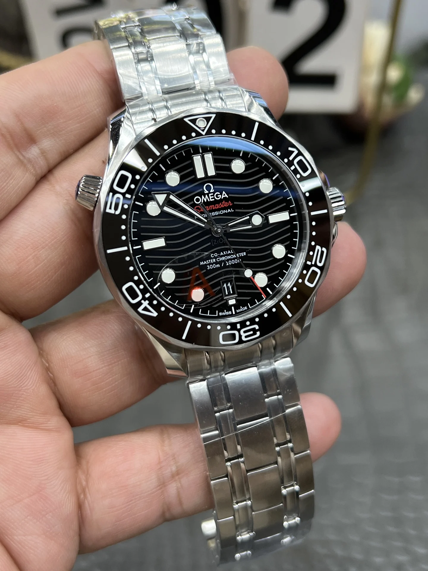 Omega Seamaster 300 Steel Black Dial — photographed off the sweep