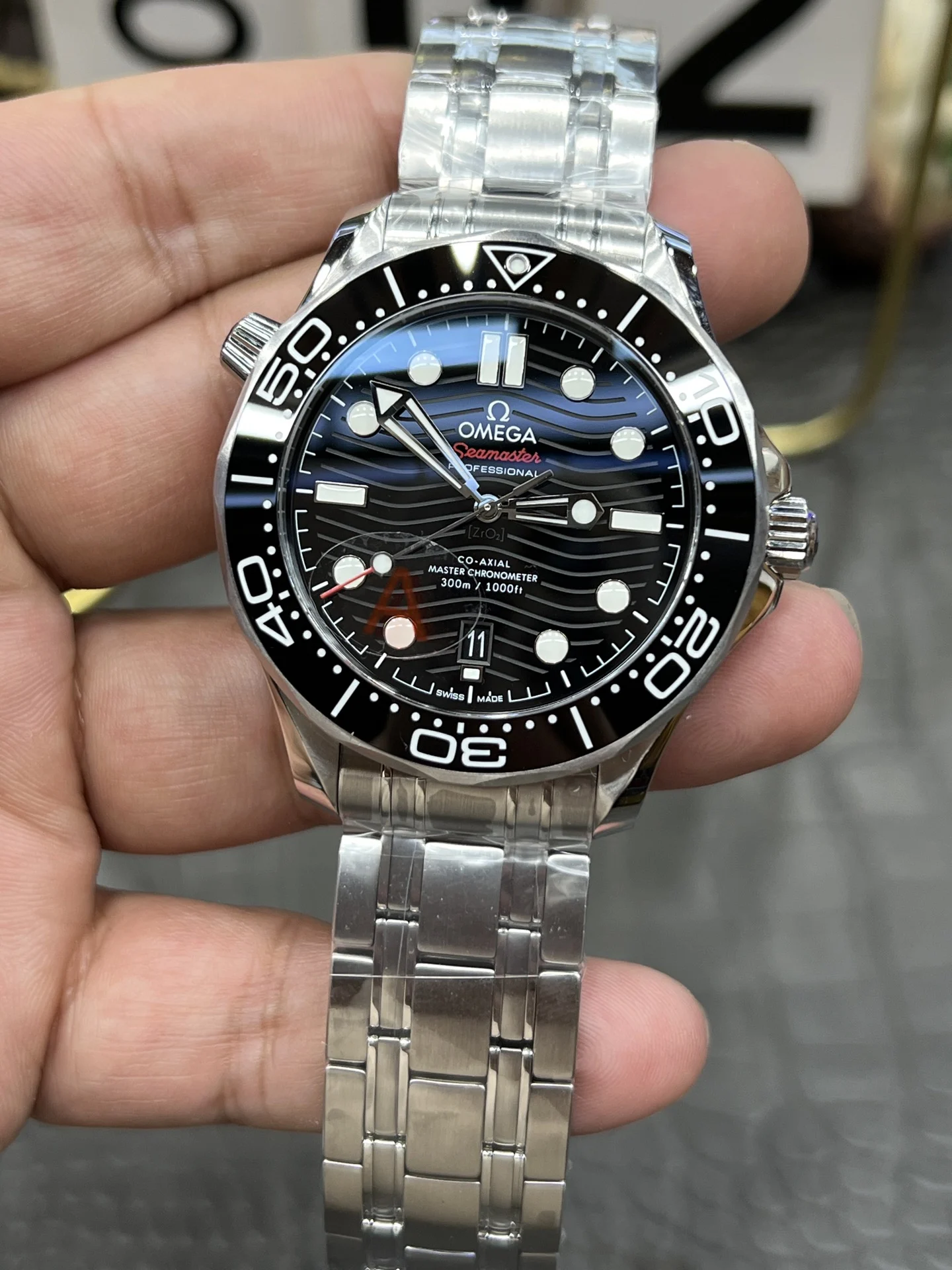 Omega Seamaster 300 Steel Black Dial — photographed off the sweep
