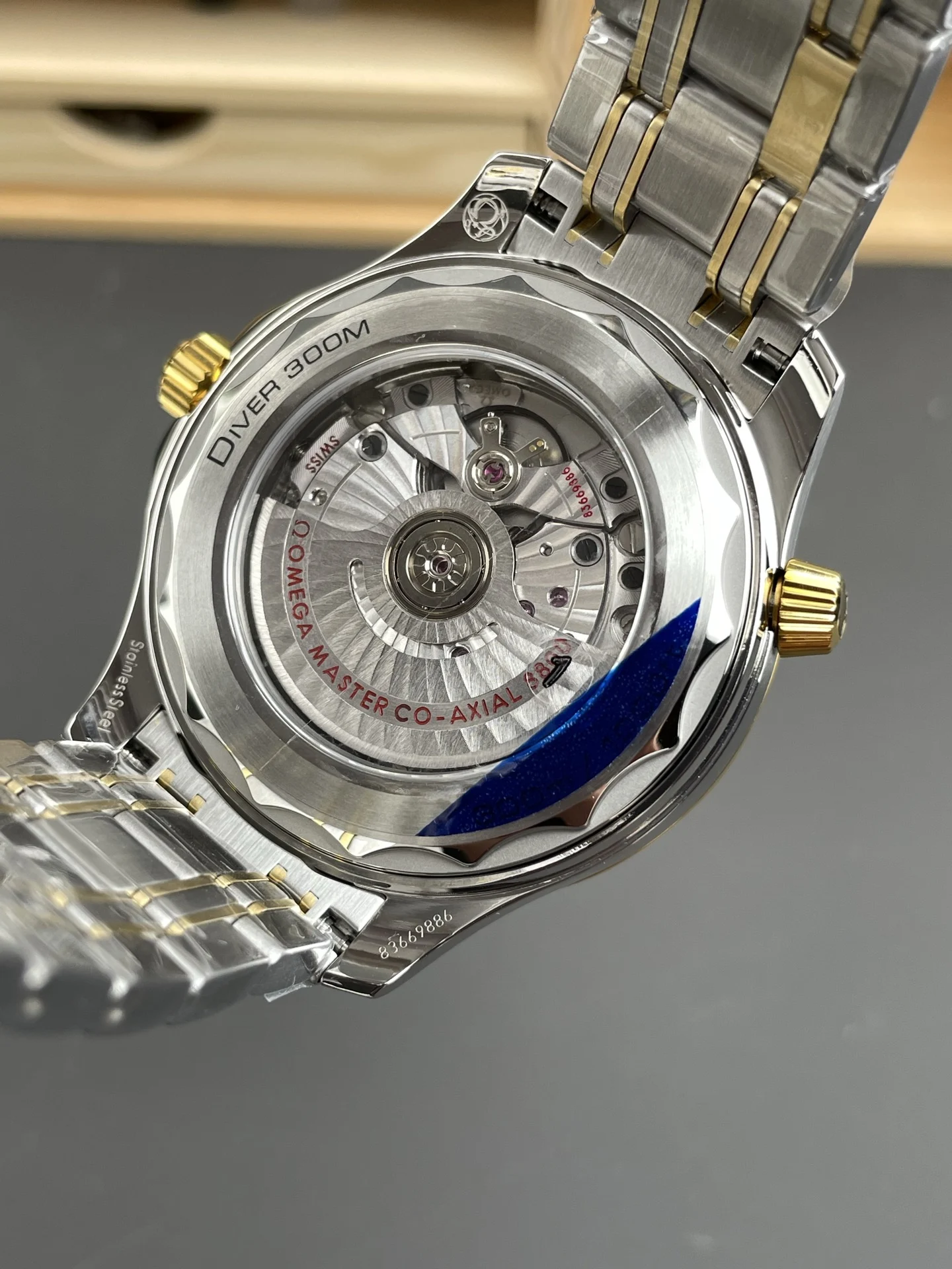 Omega Seamaster 300 Two-Tone Black Dial 42mm — photographed off the sweep