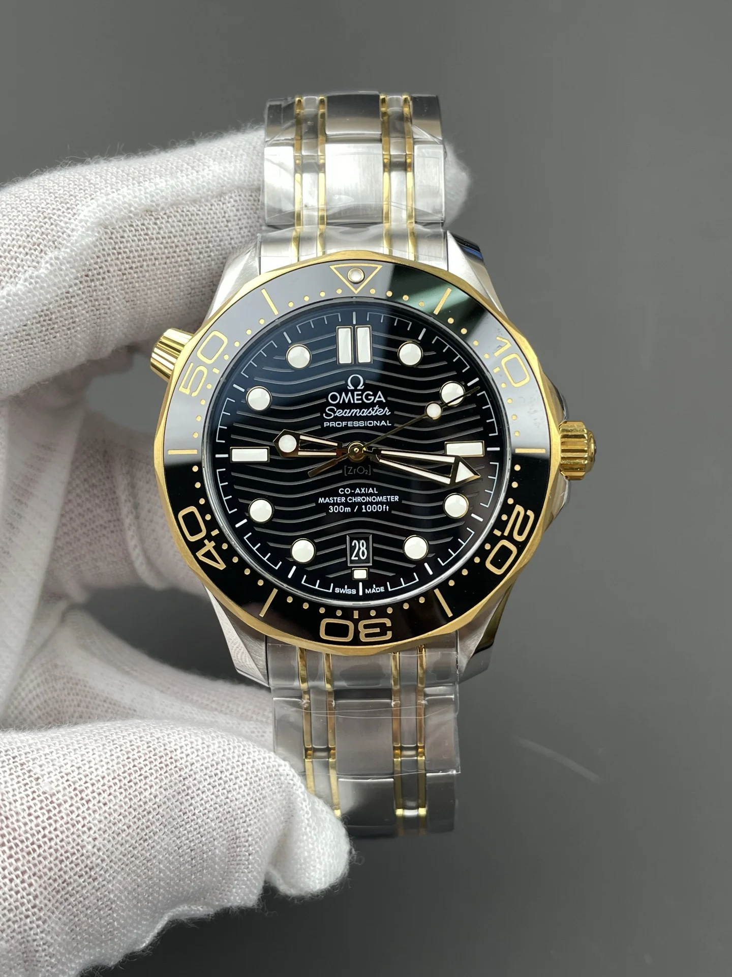 Omega Seamaster 300 Two-Tone Black Dial 42mm — photographed off the sweep