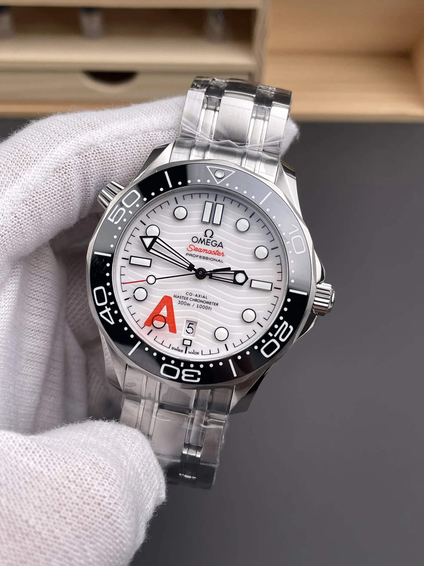 Omega Seamaster 300 White Dial 42mm — photographed off the sweep