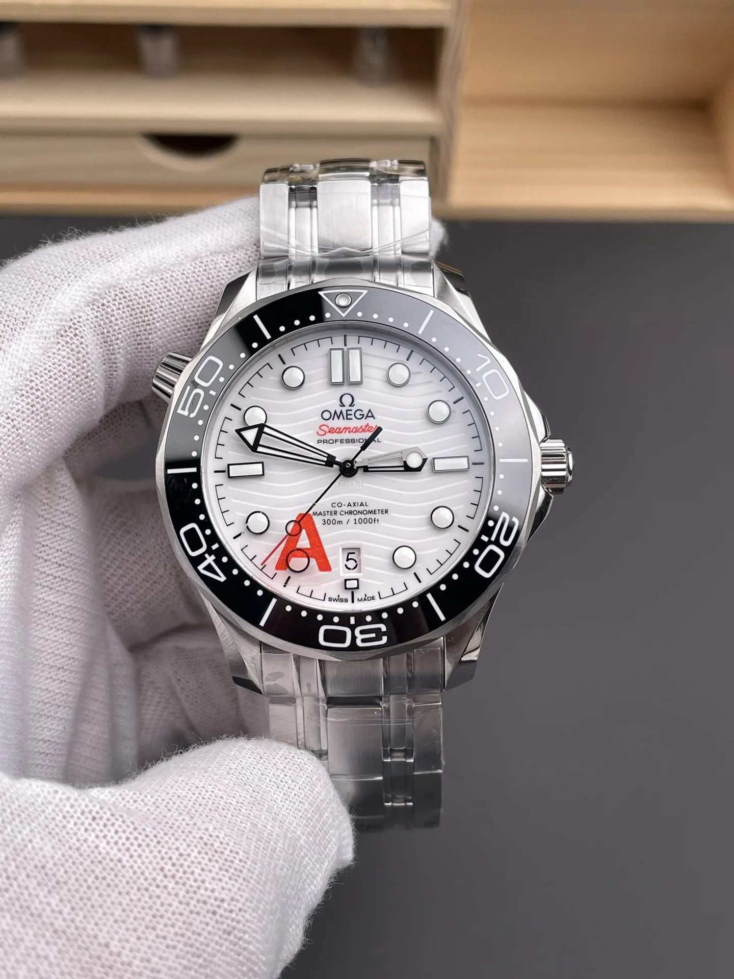 Omega Seamaster 300 White Dial 42mm — photographed off the sweep