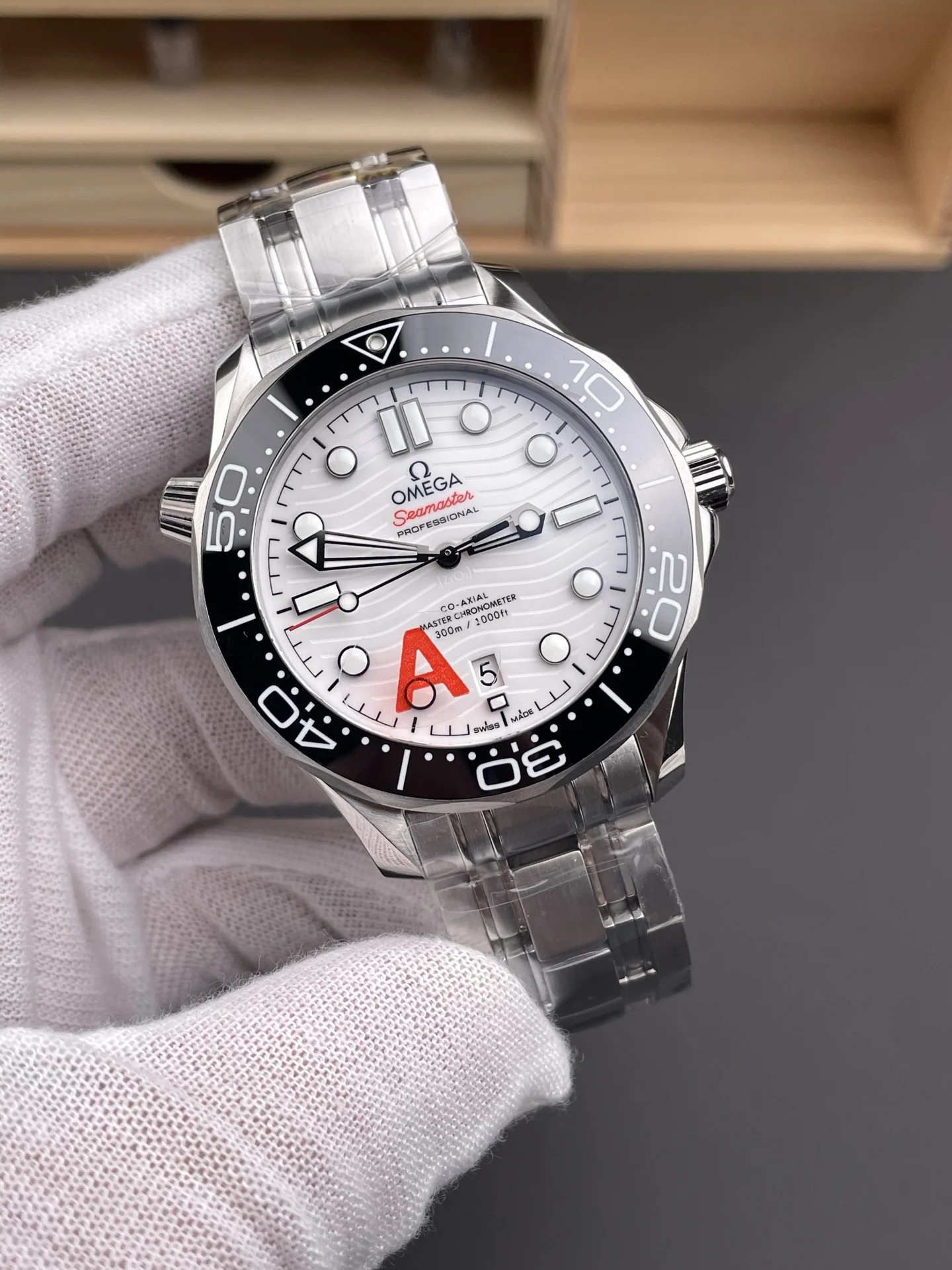 Omega Seamaster 300 White Dial 42mm — photographed off the sweep