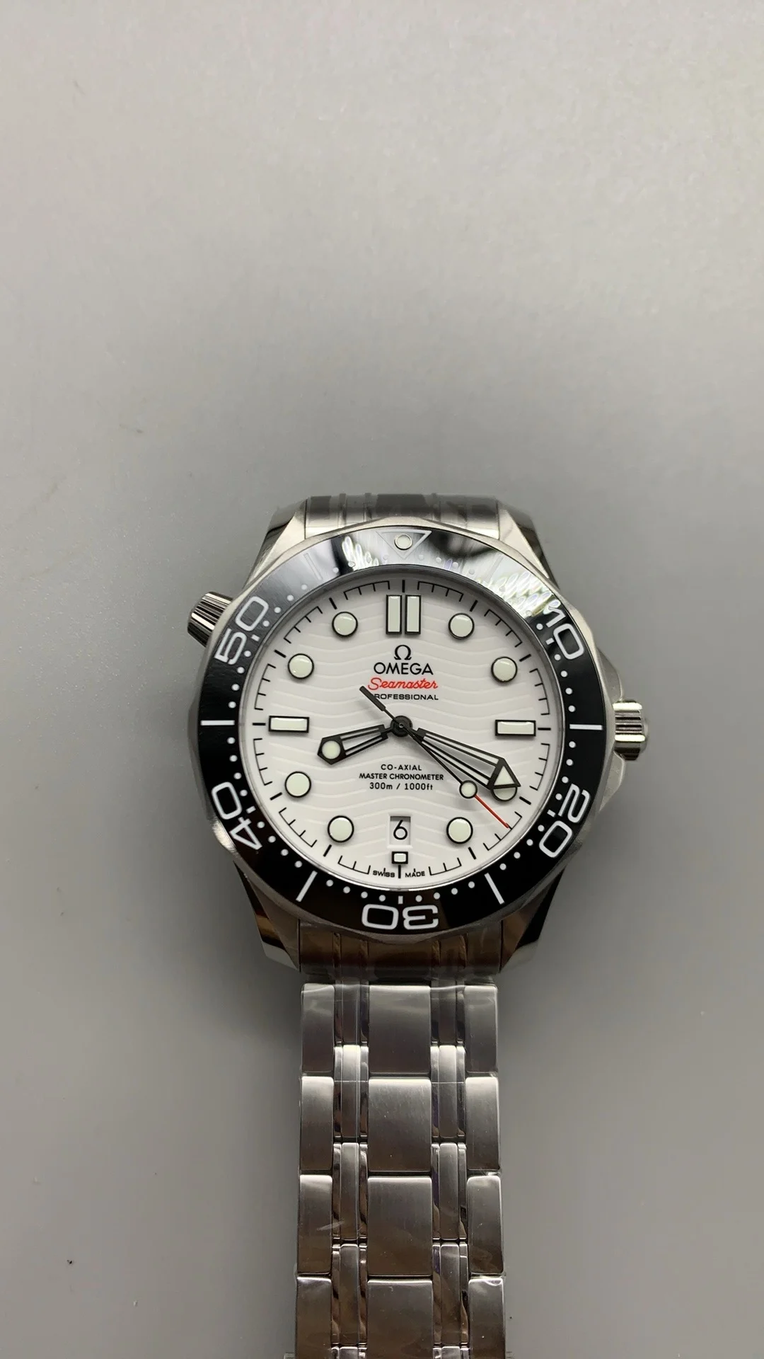 Omega Seamaster 300 White Dial — photographed off the sweep