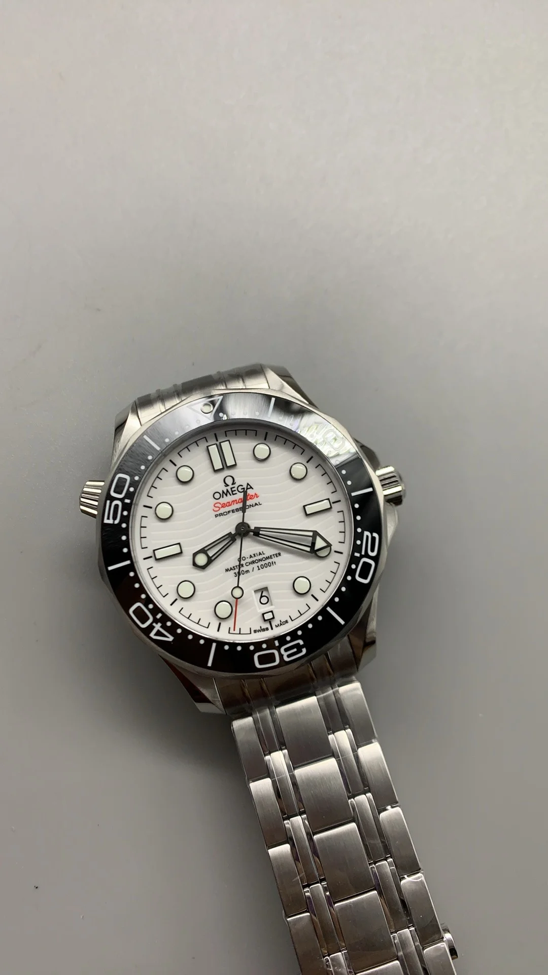 Omega Seamaster 300 White Dial — photographed off the sweep