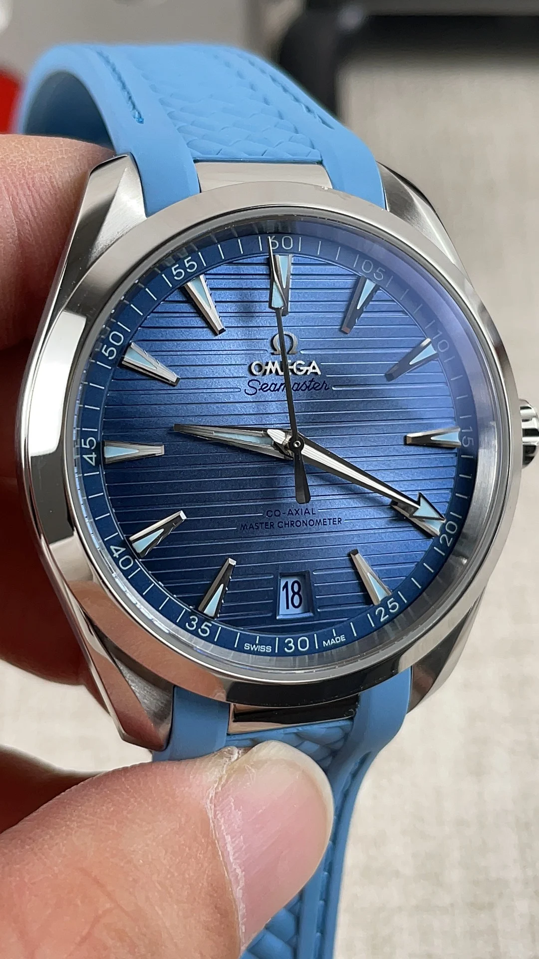 Omega Seamaster Aqua Terra Ice Blue Blue Dial — photographed off the sweep