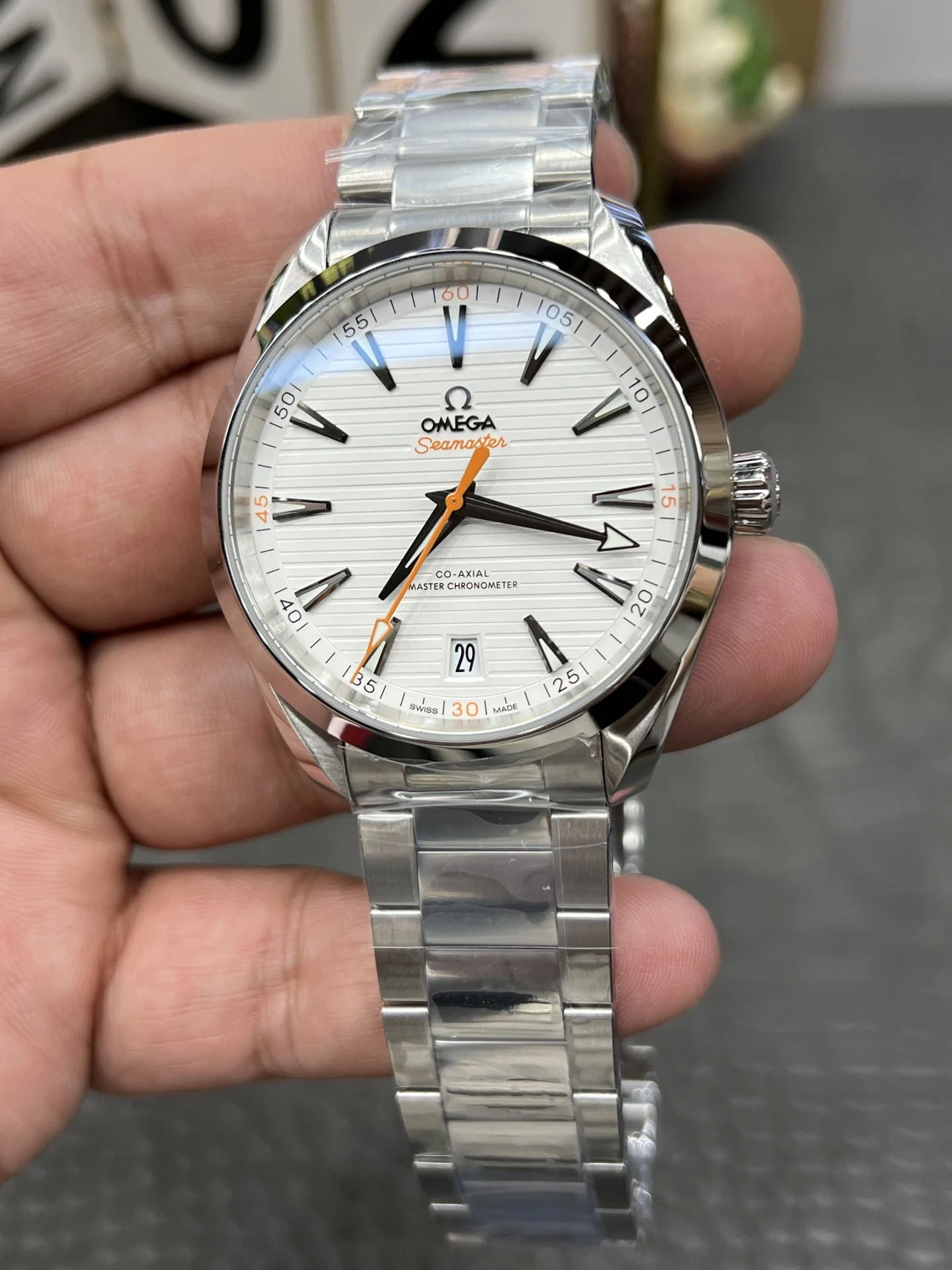 Omega Seamaster Aqua Terra Orange Dial 41.5mm — photographed off the sweep