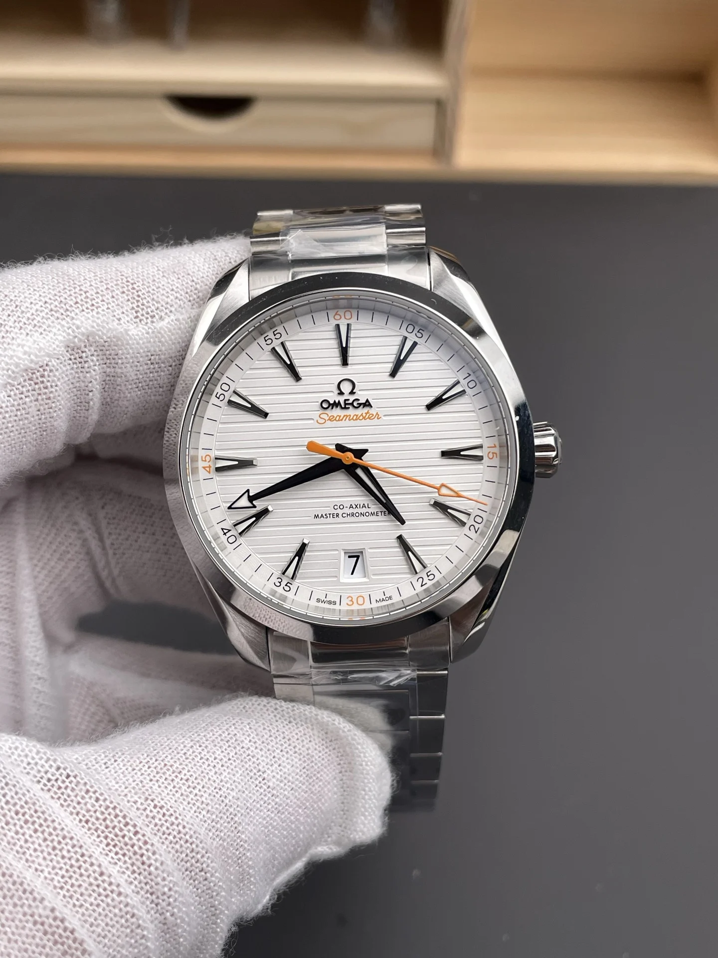 Omega Seamaster Aqua Terra Orange Dial 41mm — photographed off the sweep
