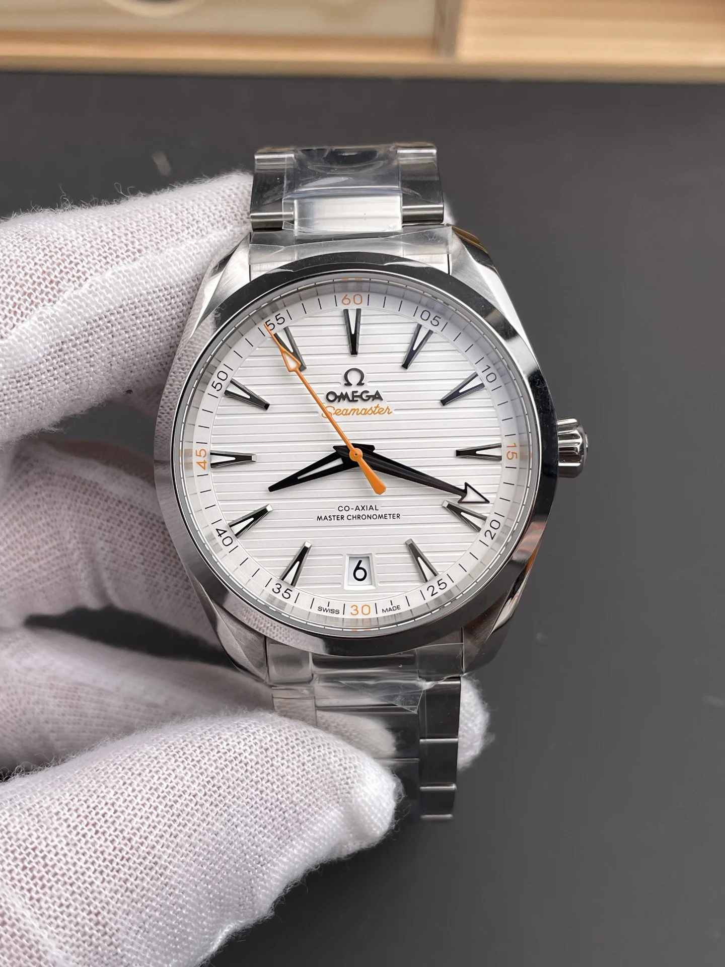 Omega Seamaster Aqua Terra Orange Dial 41mm — photographed off the sweep