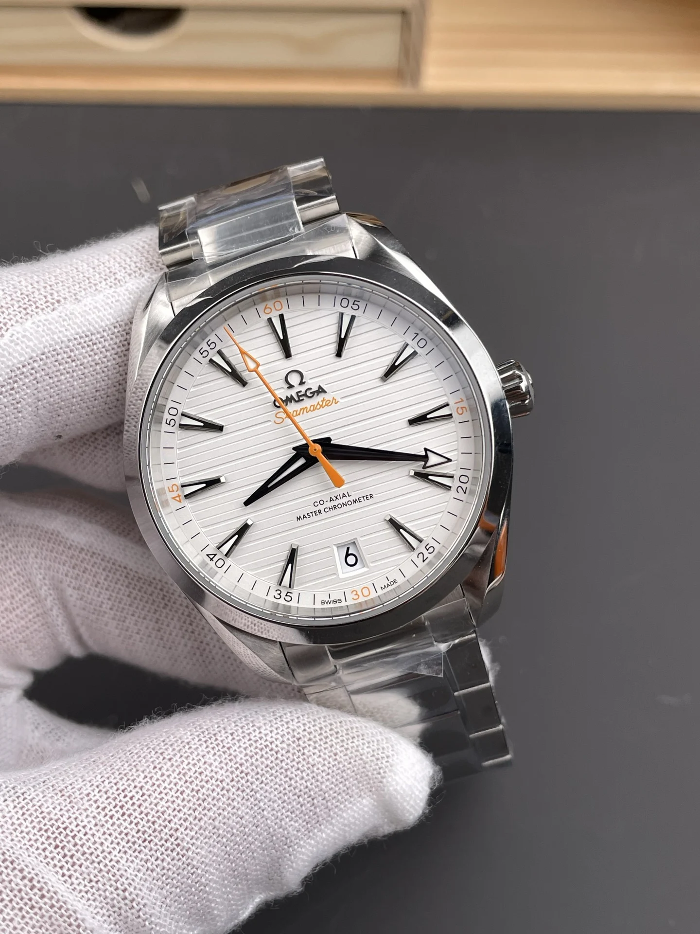 Omega Seamaster Aqua Terra Orange Dial 41mm — photographed off the sweep