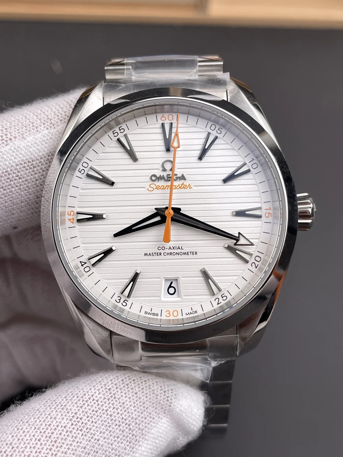 Omega Seamaster Aqua Terra Orange Dial 41mm — photographed off the sweep