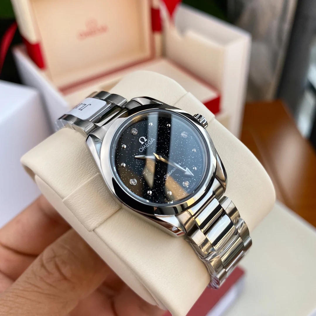 Omega Seamaster Aqua Terra Steel Purple Dial — photographed off the sweep