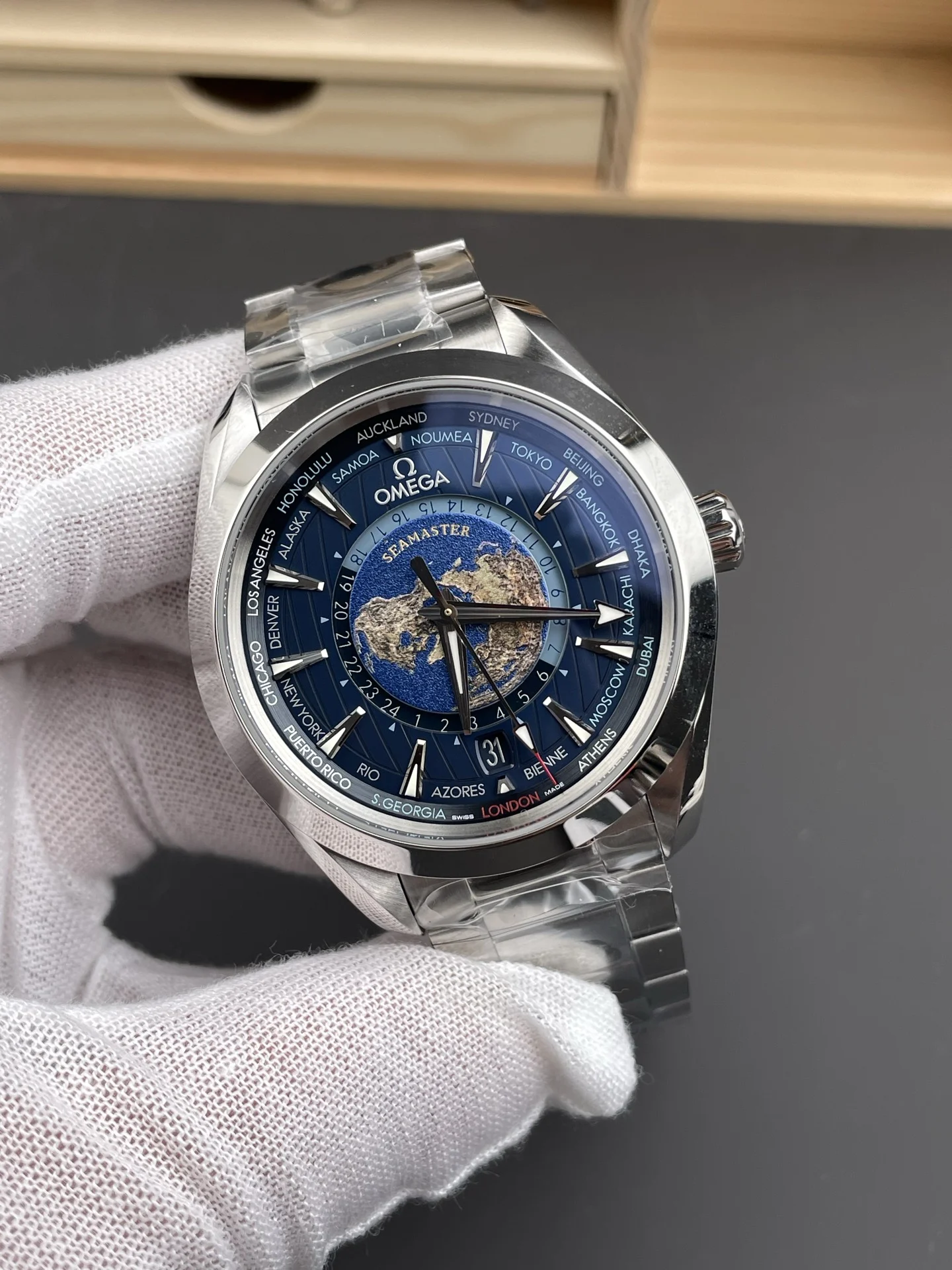 Omega Seamaster Aqua Terra World Time Blue Dial 43mm — photographed off the sweep