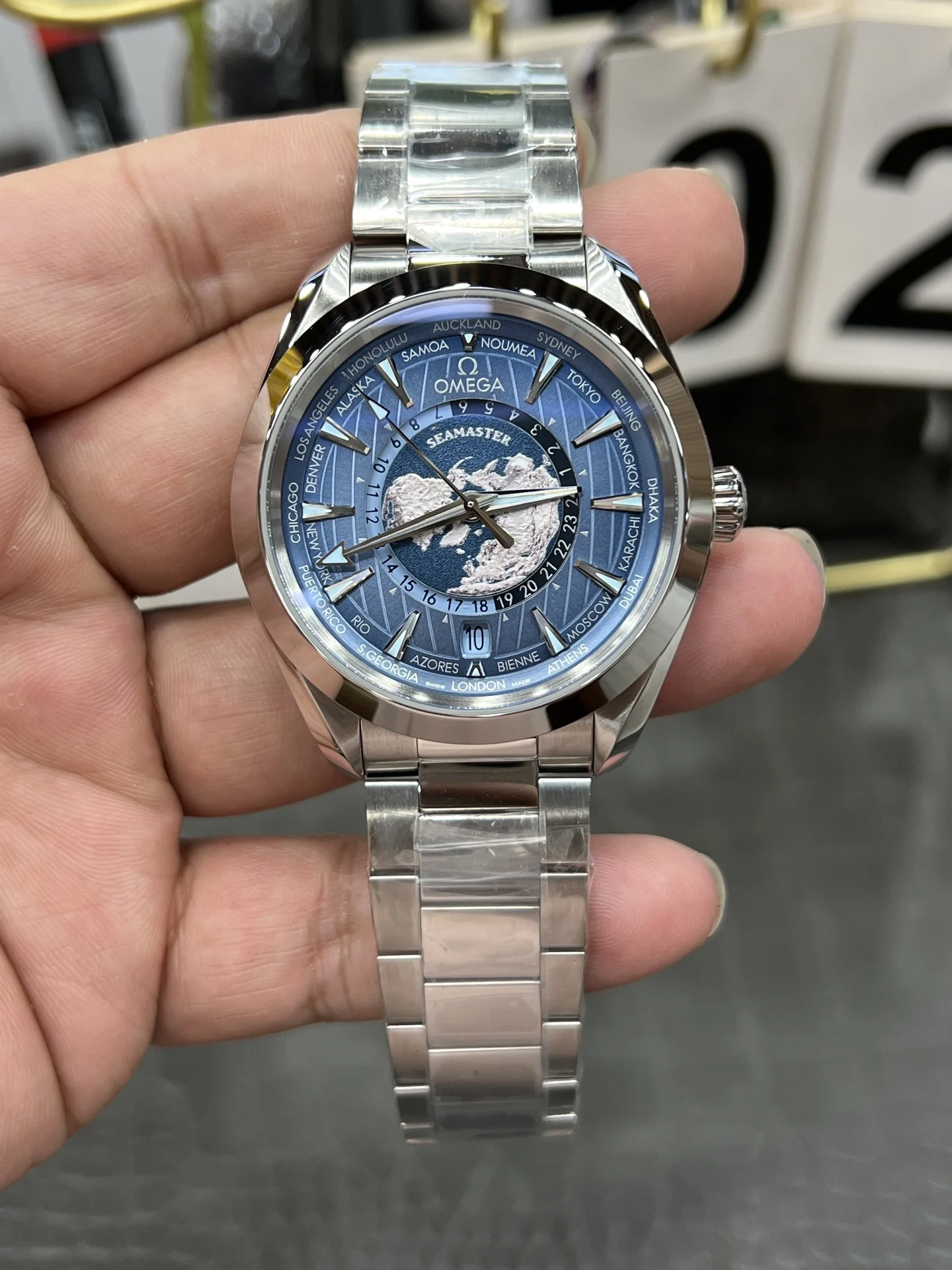 Omega Seamaster Aqua Terra World Time Blue Dial 43mm — photographed off the sweep