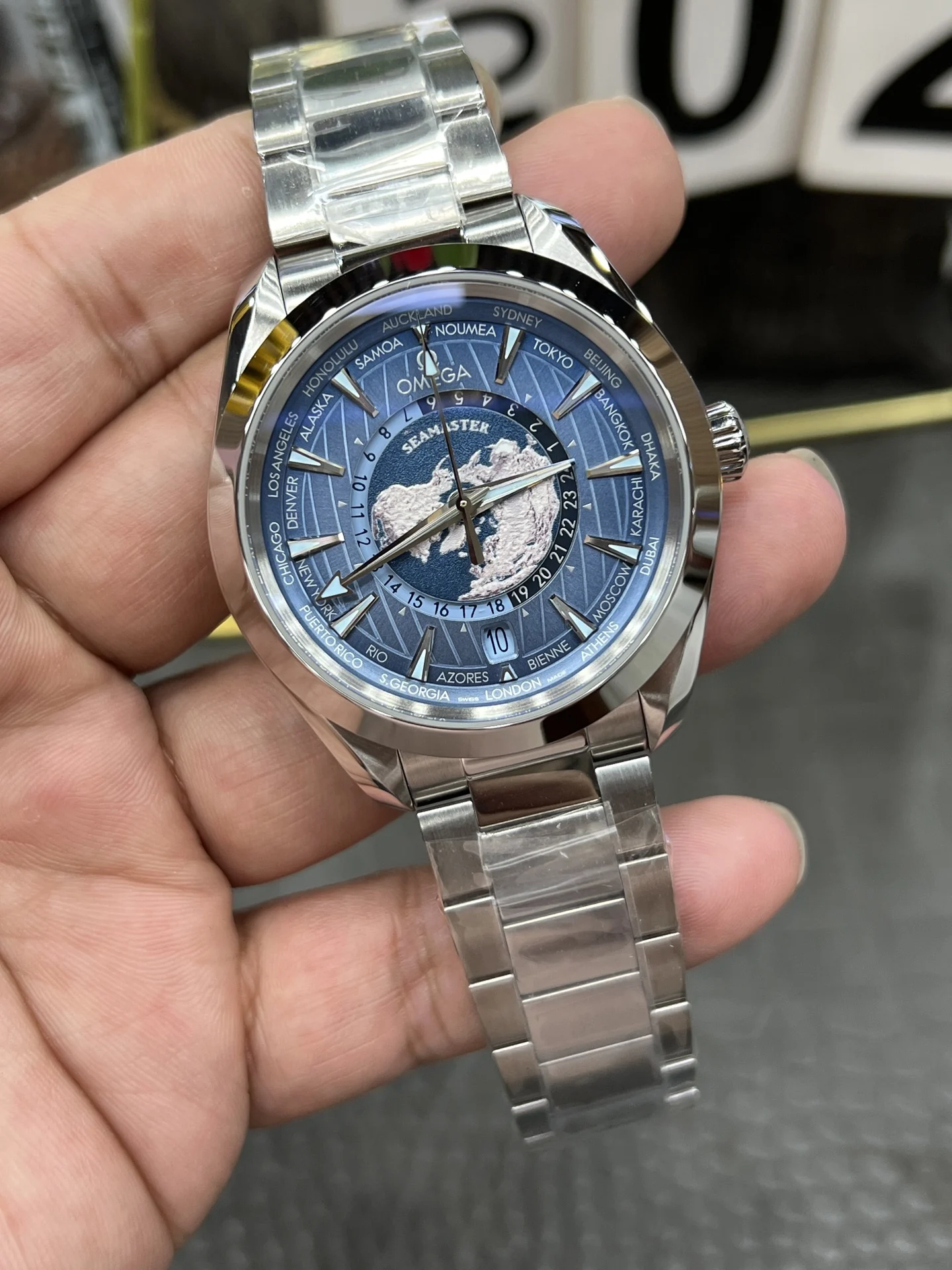Omega Seamaster Aqua Terra World Time Blue Dial 43mm — photographed off the sweep