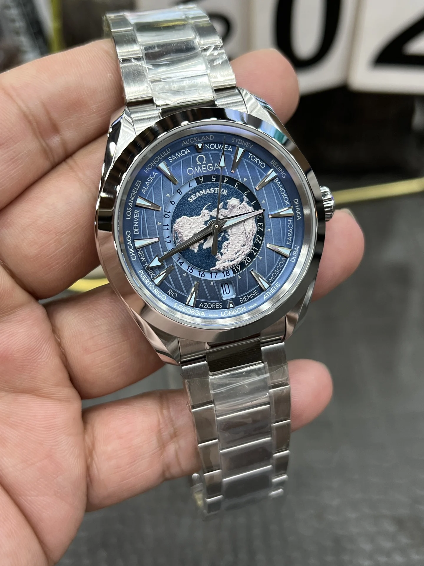 Omega Seamaster Aqua Terra World Time Blue Dial 43mm — photographed off the sweep