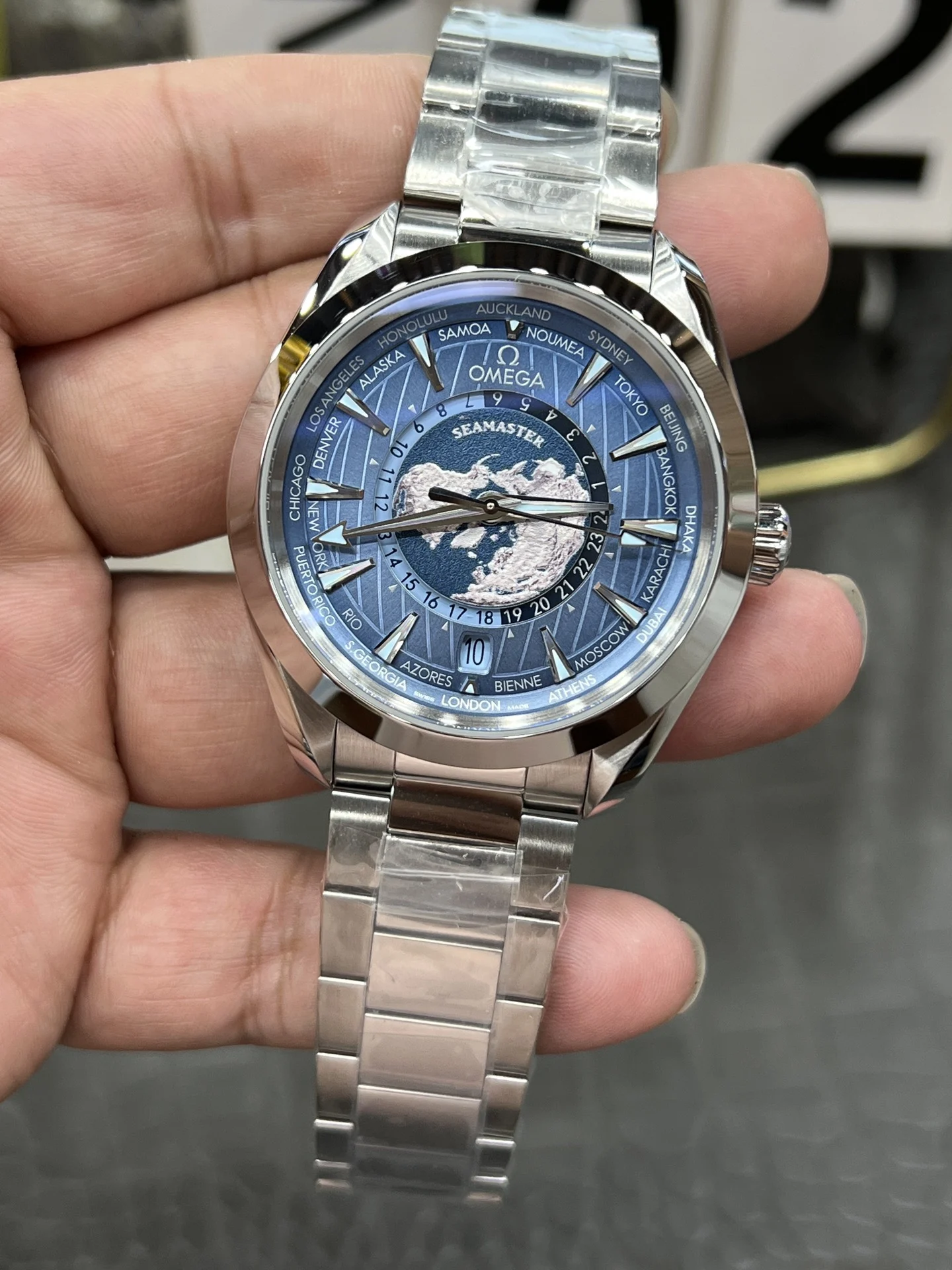 Omega Seamaster Aqua Terra World Time Blue Dial 43mm — photographed off the sweep